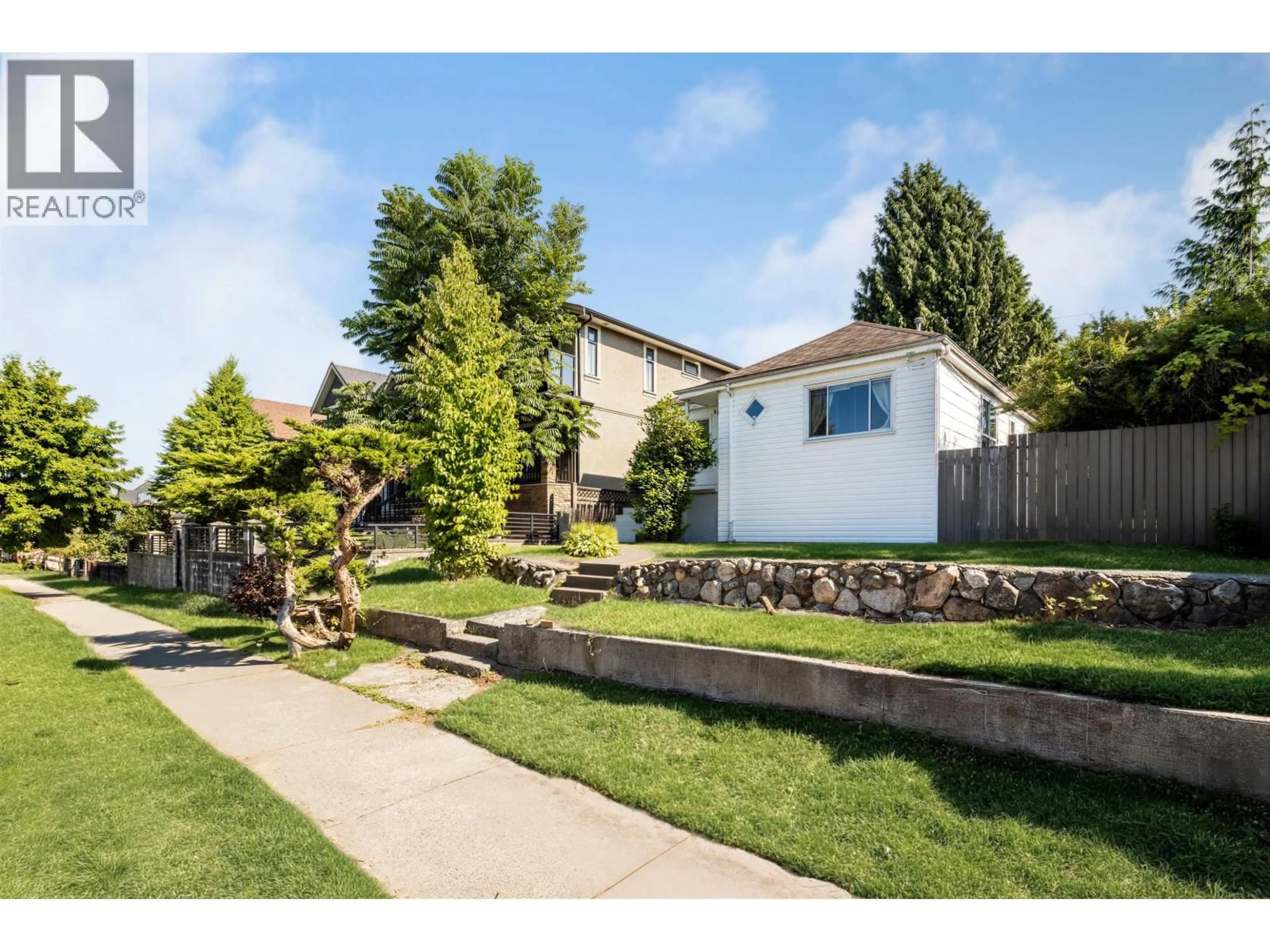 A pic from outside/outdoor area/front of a property/back of a property/a pic from drone, street for 3378 26TH AVENUE, Vancouver British Columbia V5R1L9