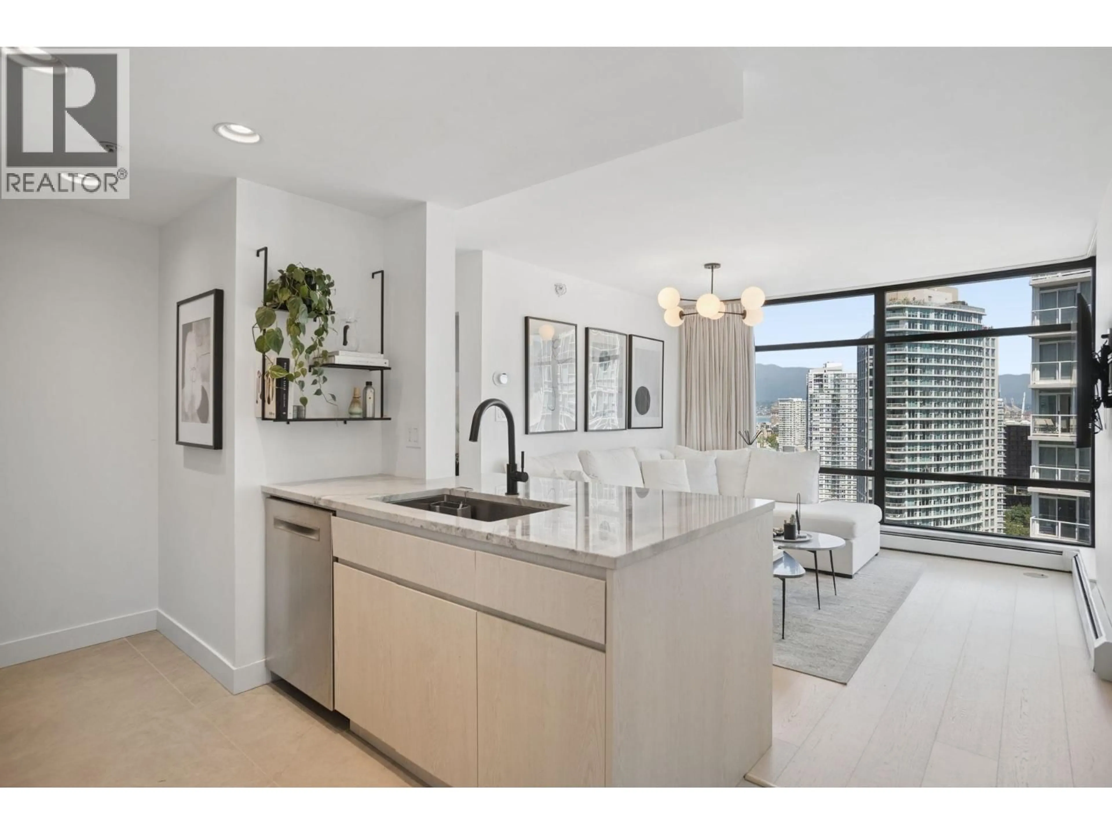 Open concept kitchen, ceramic/tile floor for 2905 - 198 AQUARIUS MEWS, Vancouver British Columbia V6Z2Y4
