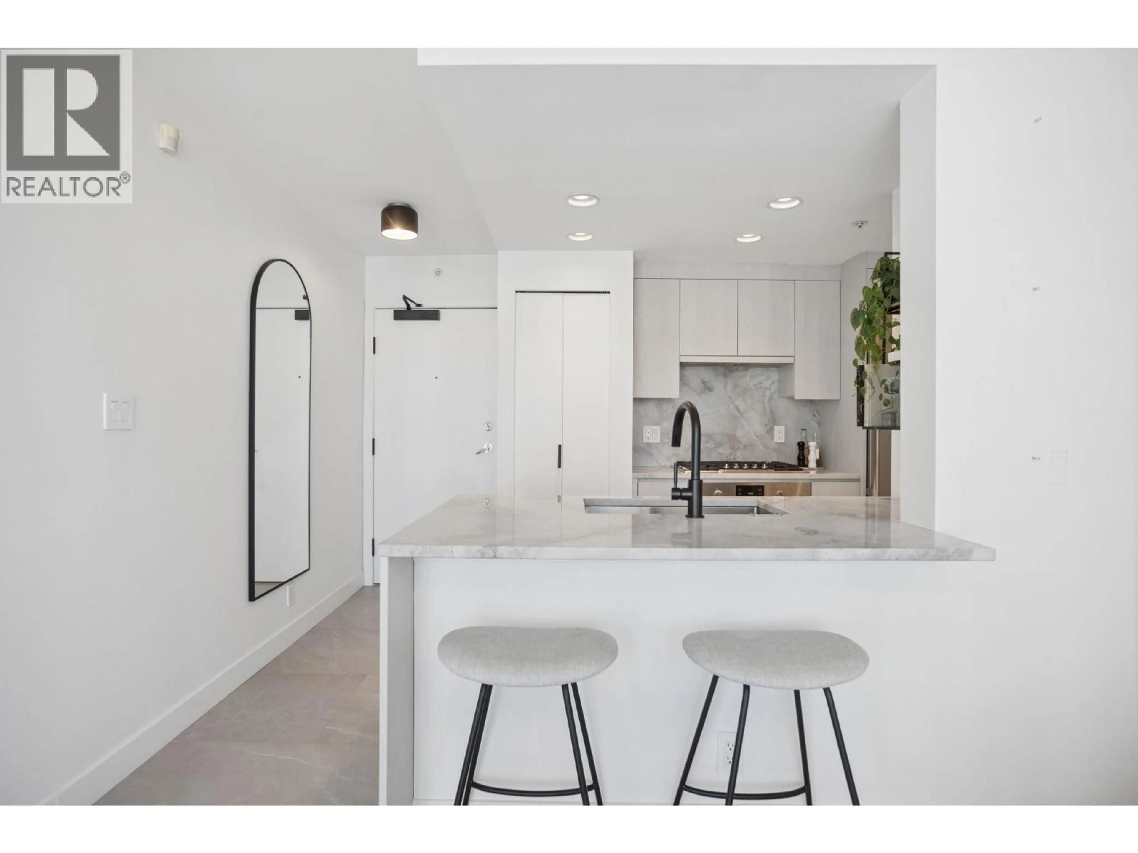 Open concept kitchen, ceramic/tile floor for 2905 - 198 AQUARIUS MEWS, Vancouver British Columbia V6Z2Y4