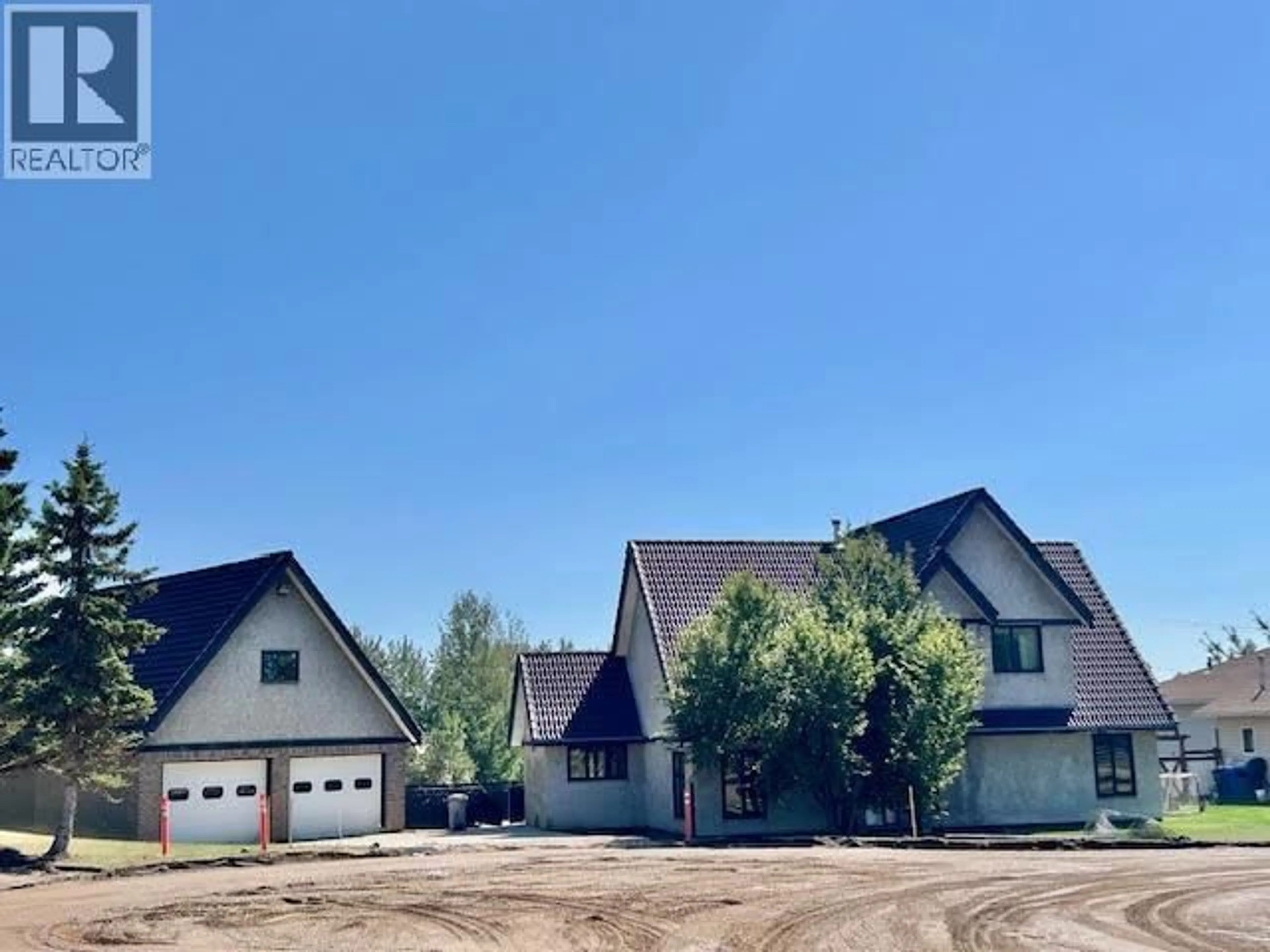 A pic from outside/outdoor area/front of a property/back of a property/a pic from drone, unknown for 5516 MINNAKER CRESCENT, Fort Nelson British Columbia V0C1R0