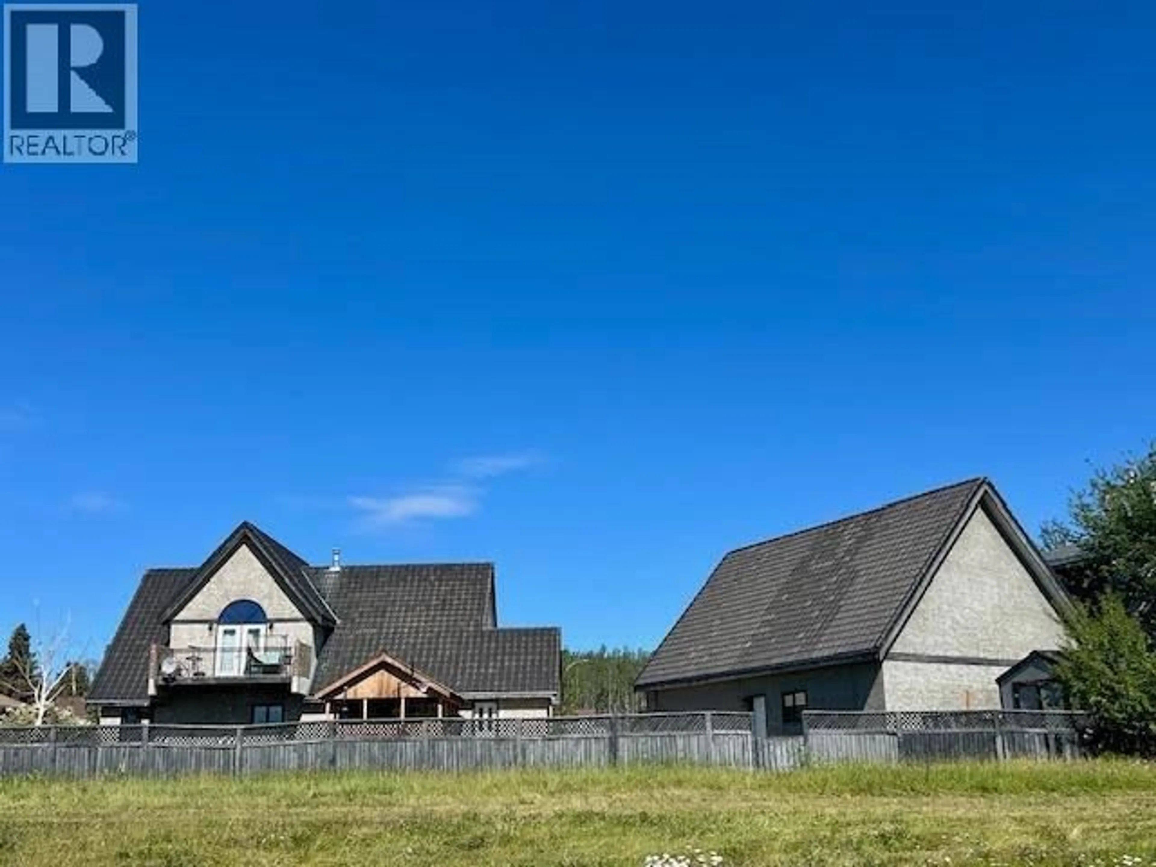 A pic from outside/outdoor area/front of a property/back of a property/a pic from drone, mountain view for 5516 MINNAKER CRESCENT, Fort Nelson British Columbia V0C1R0