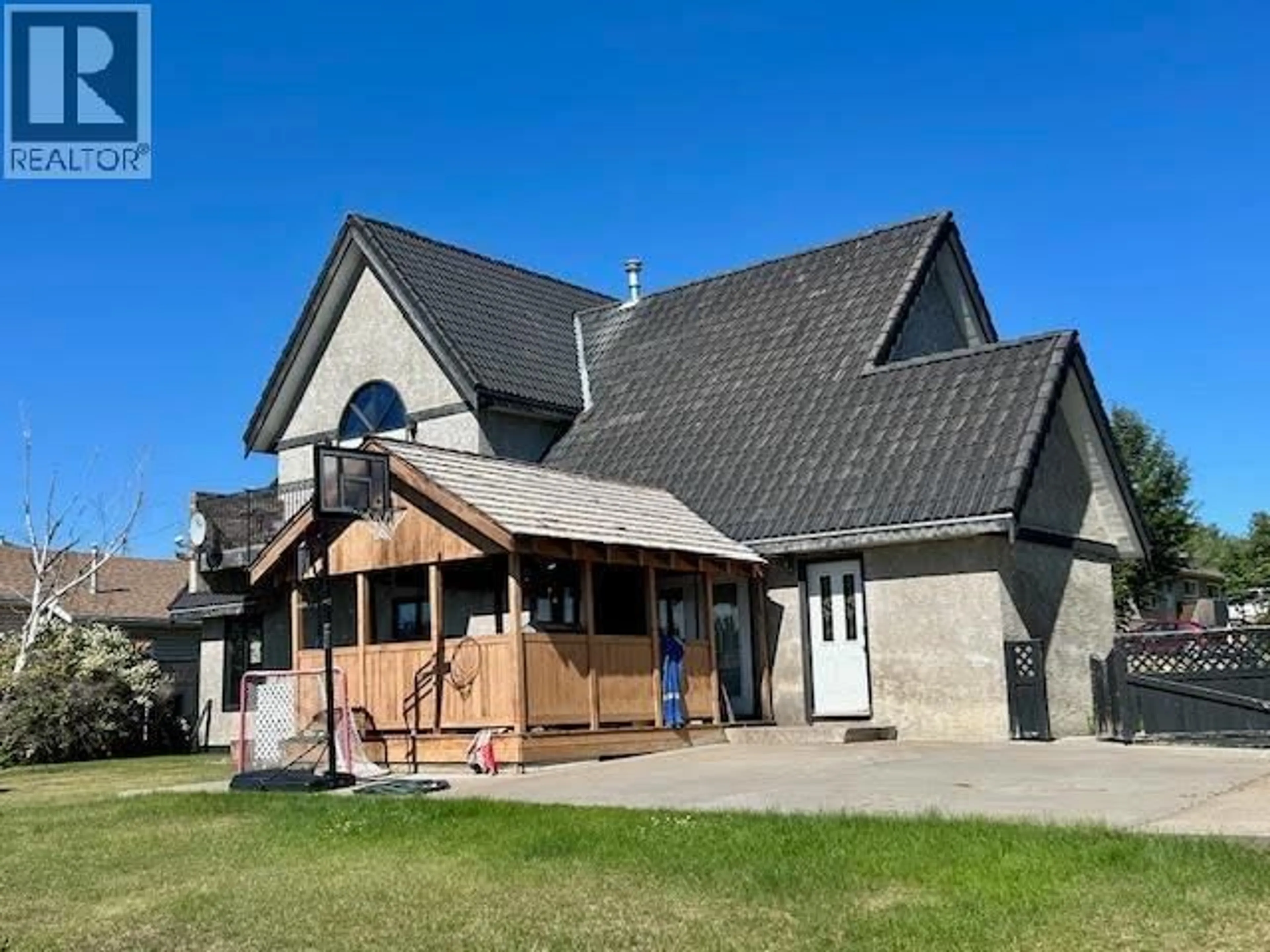 A pic from outside/outdoor area/front of a property/back of a property/a pic from drone, building for 5516 MINNAKER CRESCENT, Fort Nelson British Columbia V0C1R0