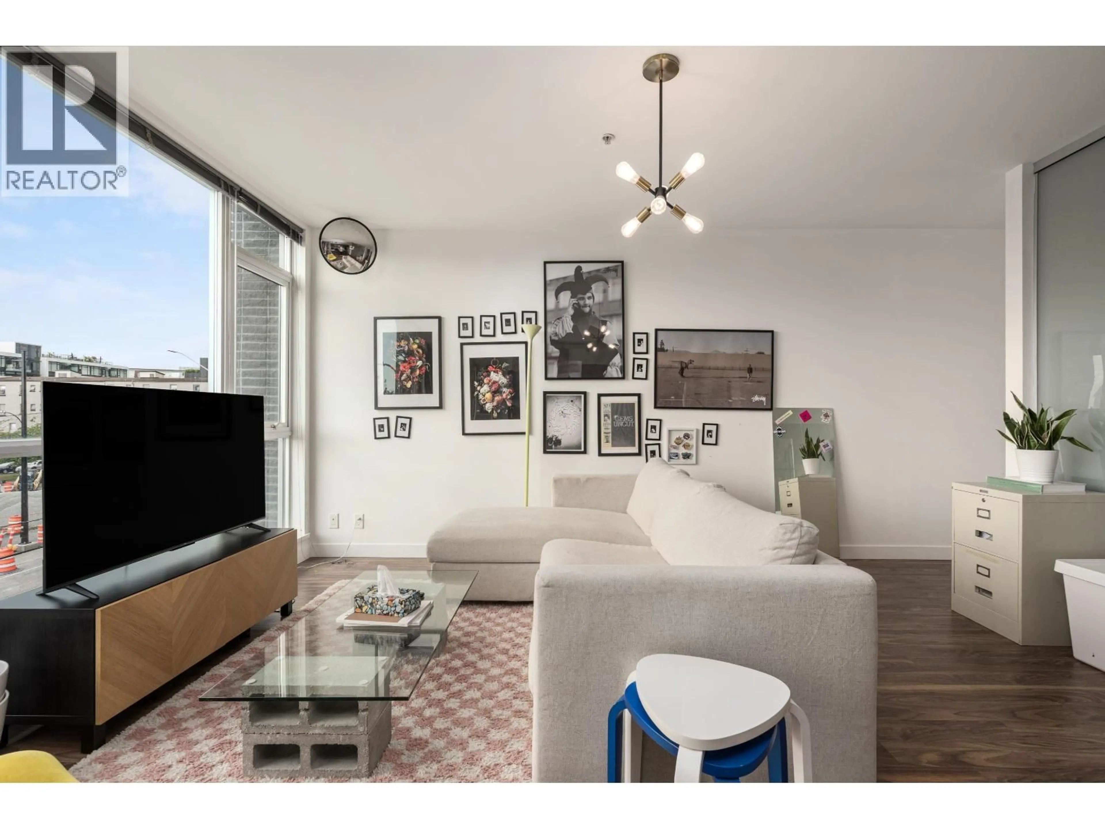 Living room with furniture, unknown for 208 - 2511 QUEBEC STREET, Vancouver British Columbia V5T0B6