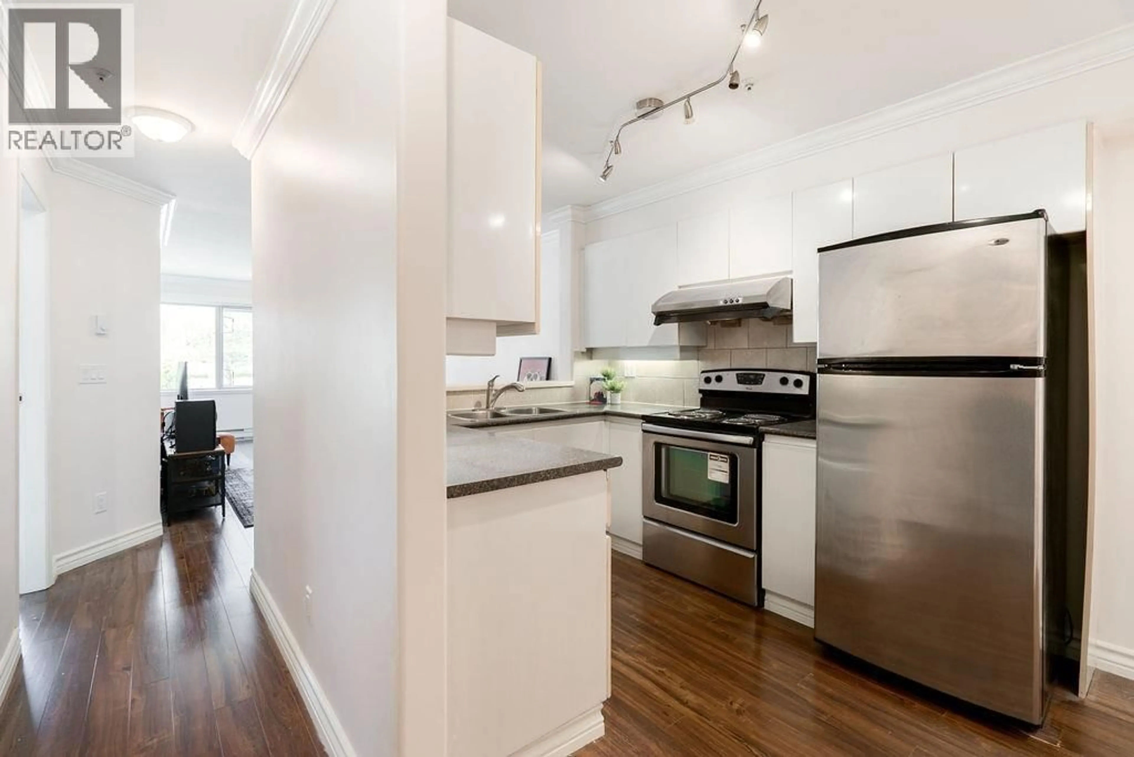 Open concept kitchen, wood/laminate floor for 301 - 210 CARNARVON STREET, New Westminster British Columbia V3L1B8