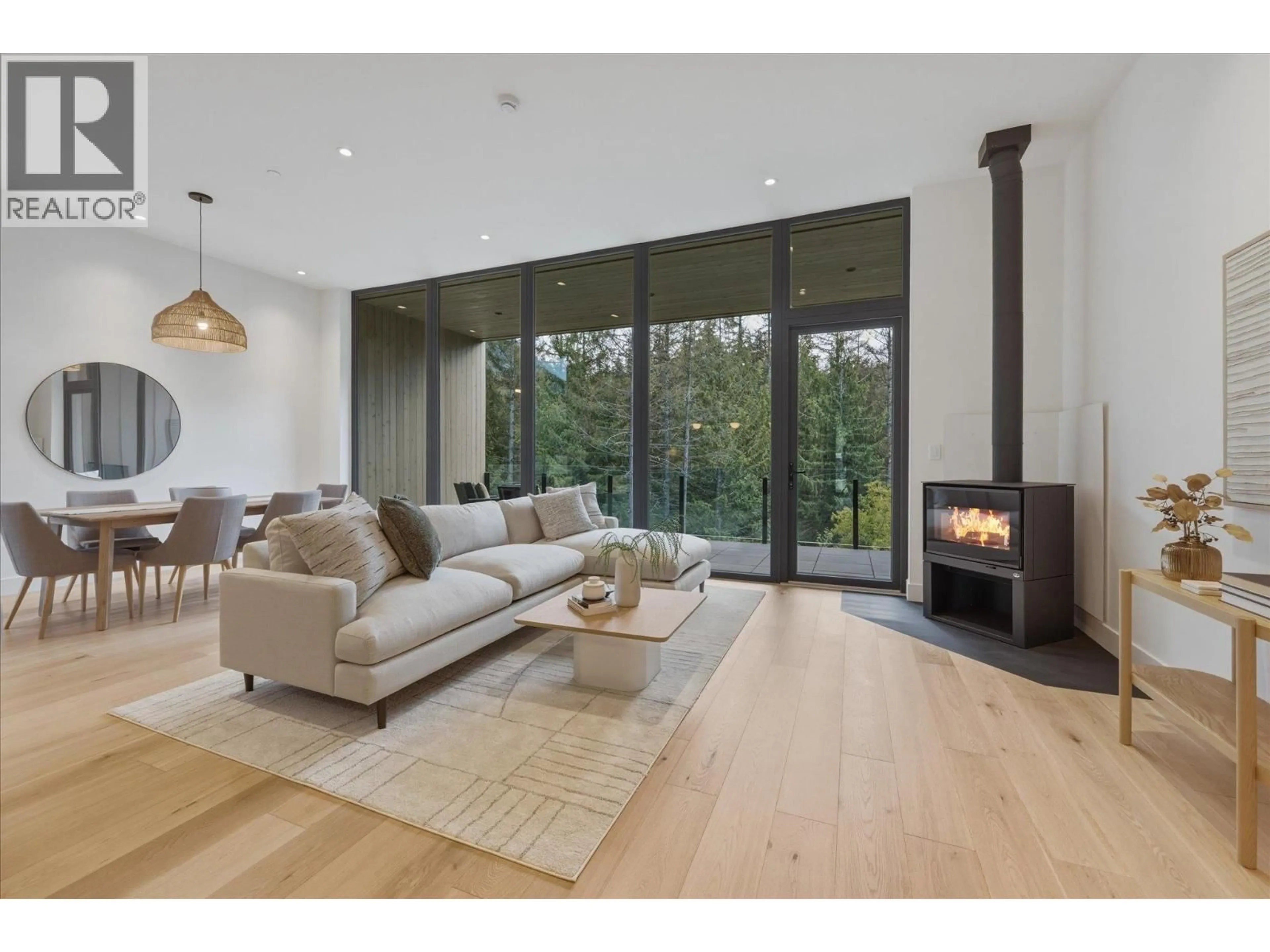Living room with furniture, wood/laminate floor for 1702 RIVER RUN PLACE, Whistler British Columbia V8E1P4