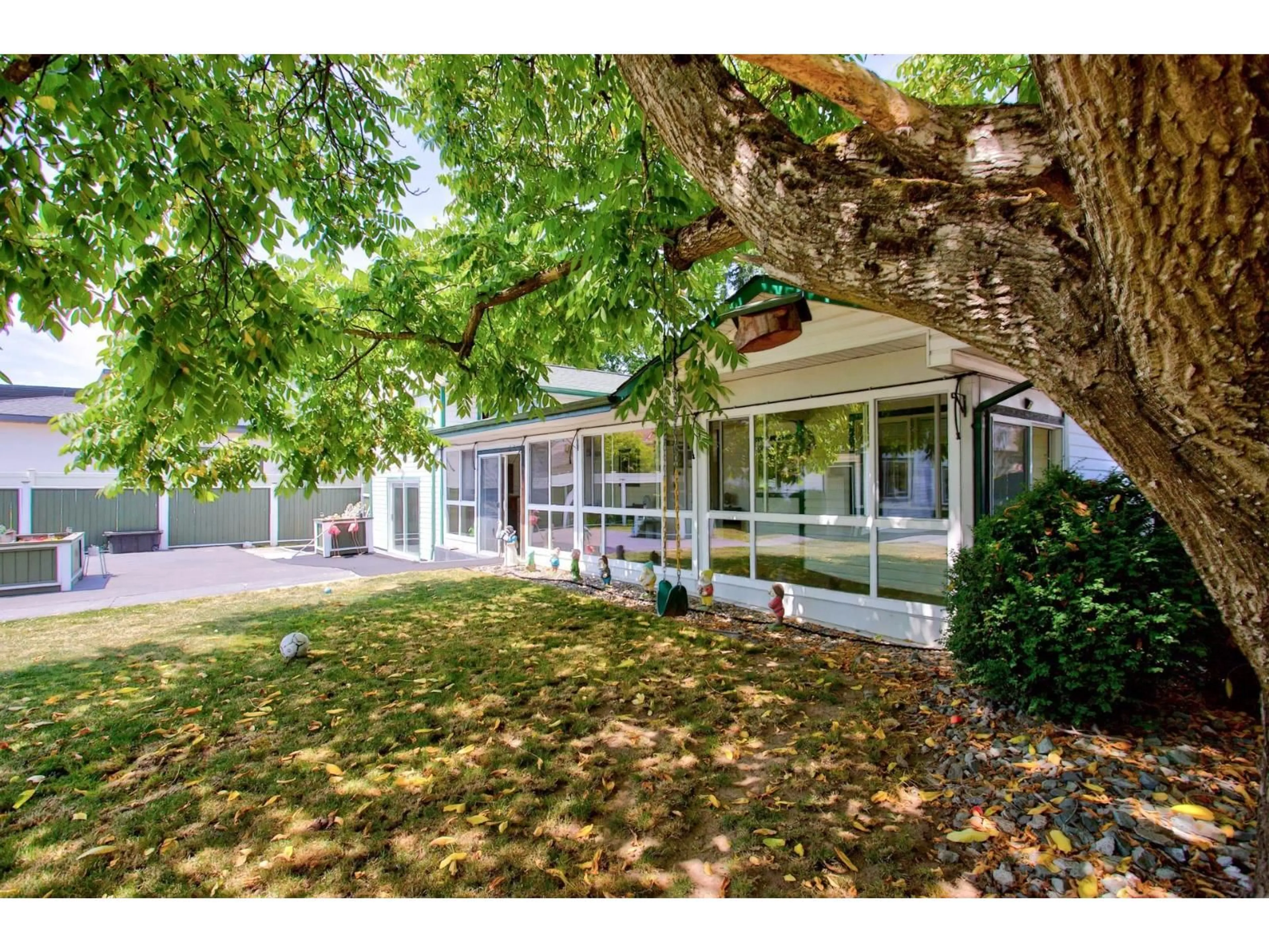 A pic from outside/outdoor area/front of a property/back of a property/a pic from drone, street for 12488 92 AVENUE, Surrey British Columbia V3V1G5