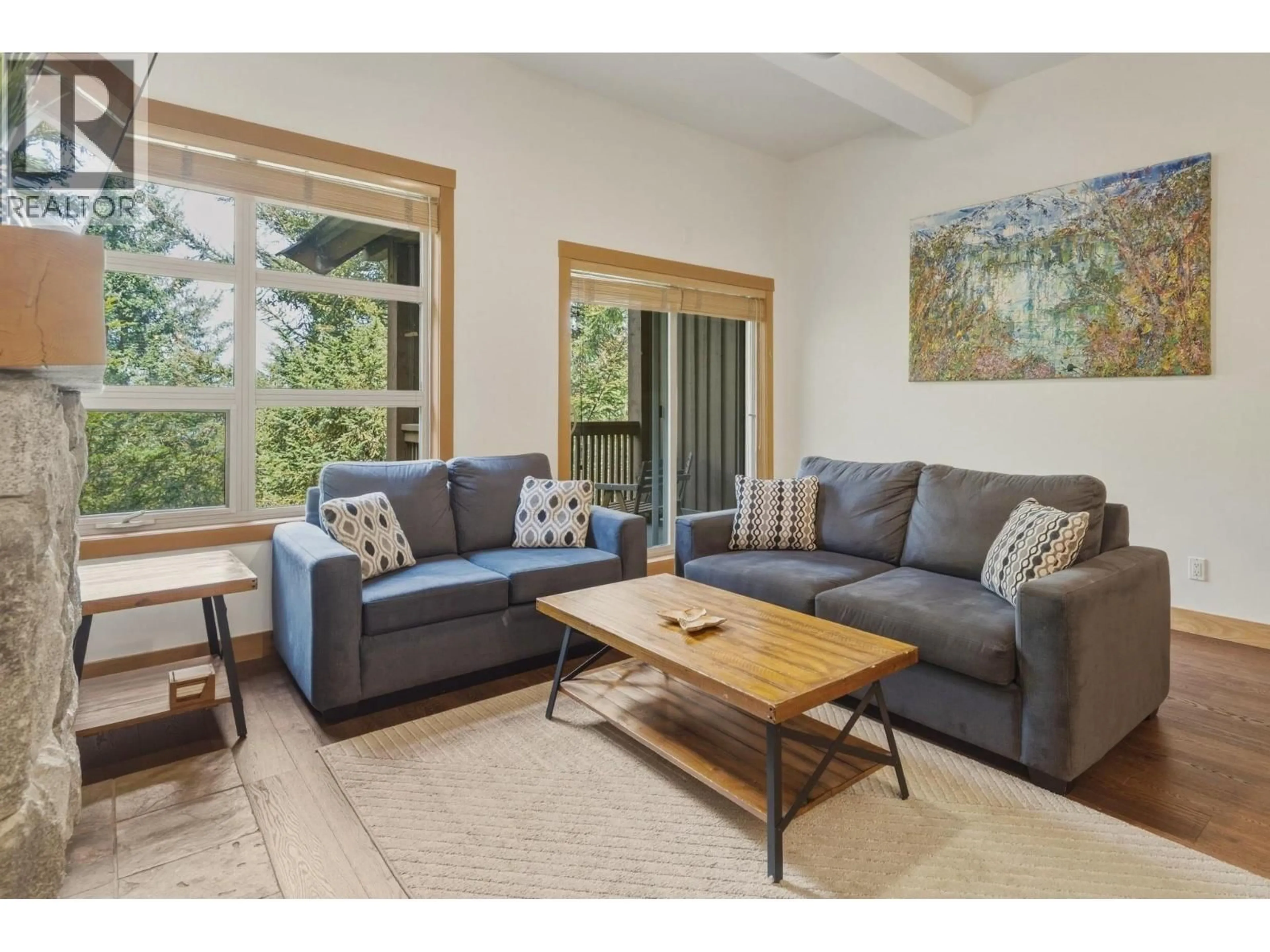 Living room with furniture, wood/laminate floor for 27 - 4894 PAINTED CLIFF ROAD, Whistler British Columbia V8E1E1