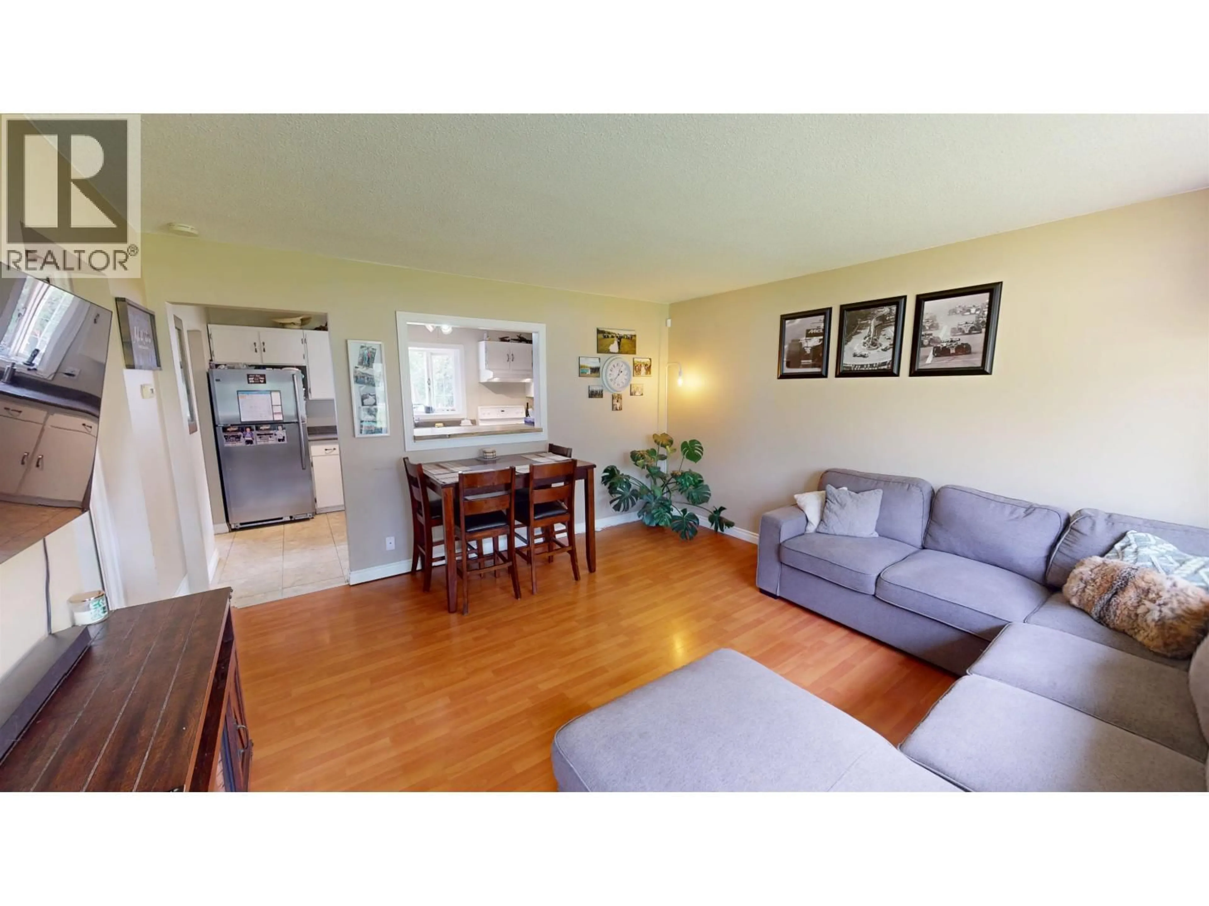 Living room with furniture, wood/laminate floor for 1282 HAUSAMAN ROAD, Quesnel British Columbia V2J3V1