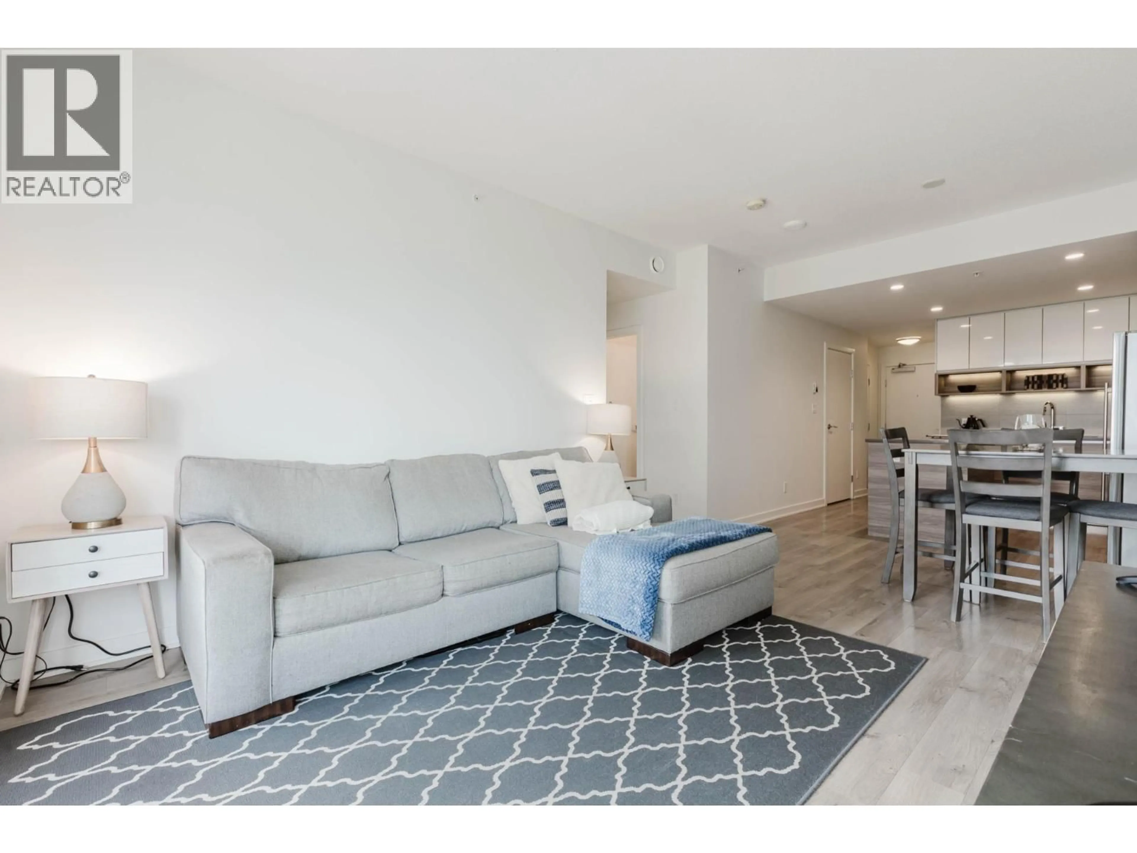 Living room with furniture, unknown for 909 - 8850 UNIVERSITY CRESCENT, Burnaby British Columbia V5A0C8