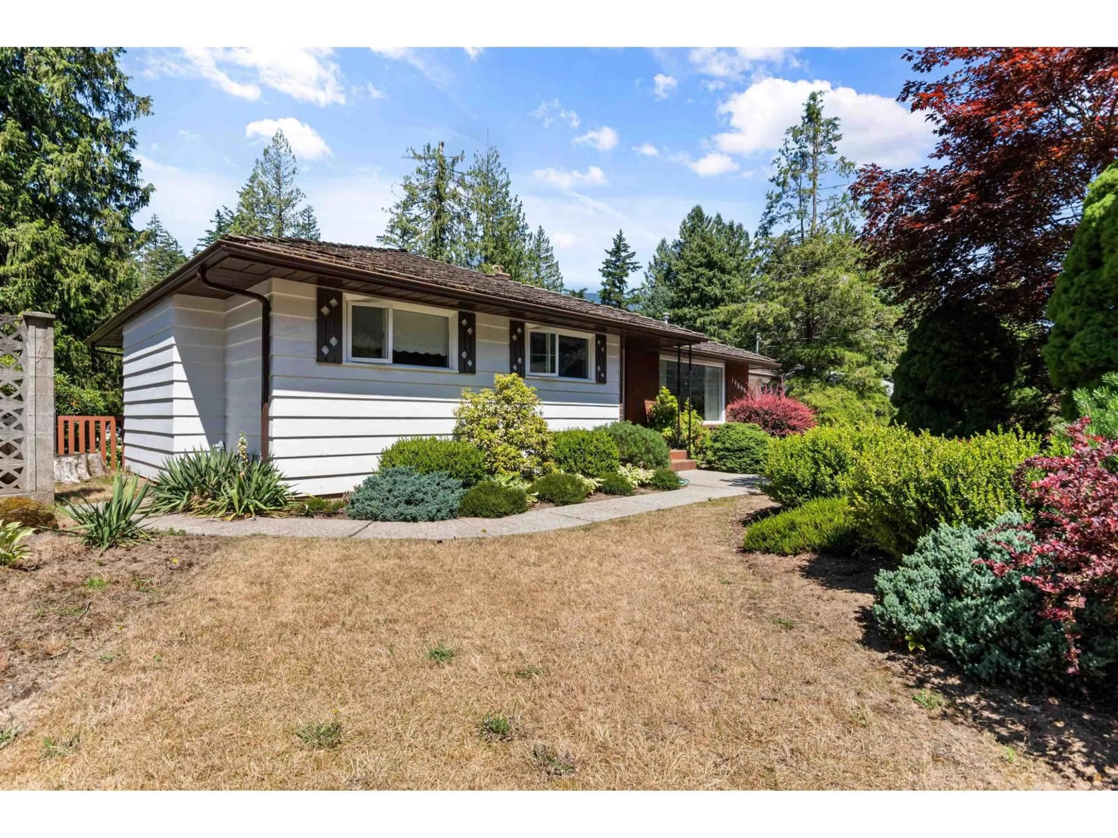 Home with vinyl exterior material, street for 19899 SILVERHOPE ROAD, Hope British Columbia V0X1L2
