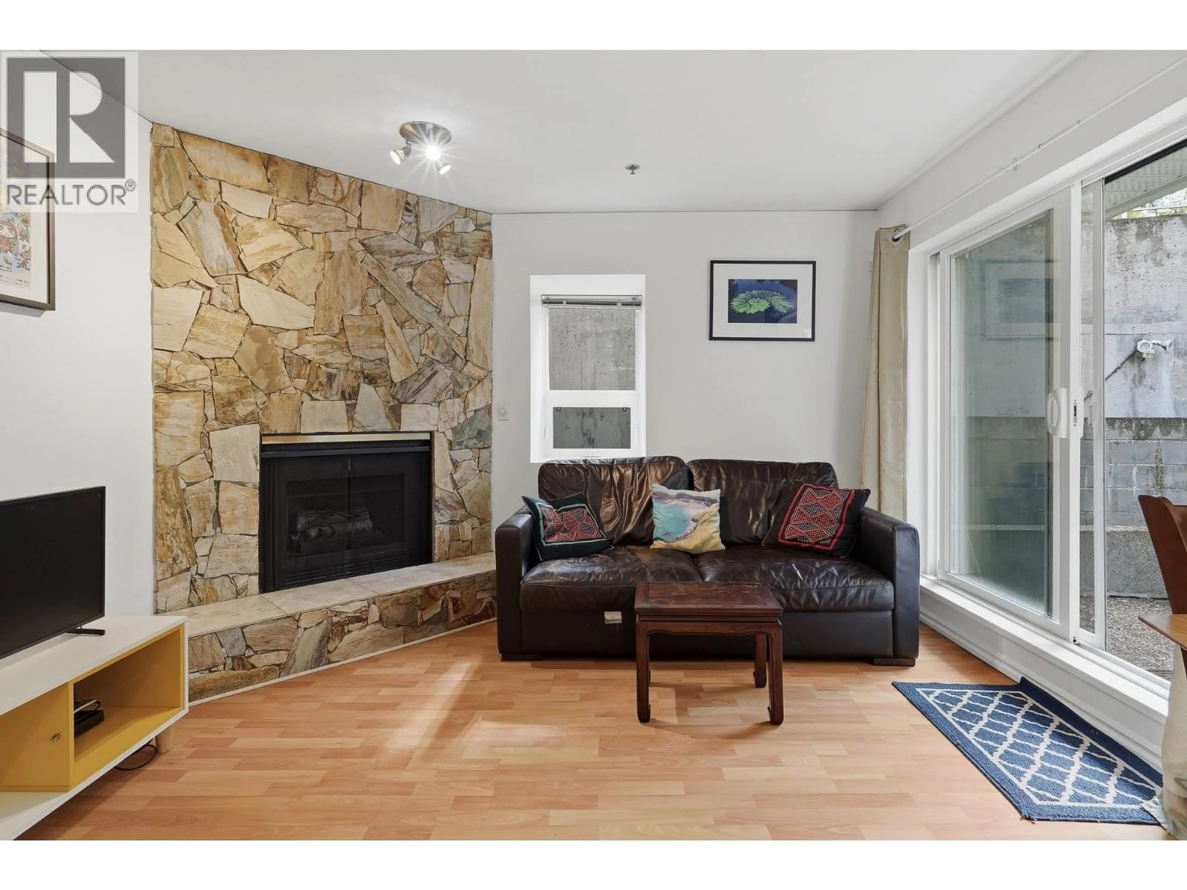 Living room with furniture, unknown for 101 - 2295 PANDORA STREET, Vancouver British Columbia V5L1N6