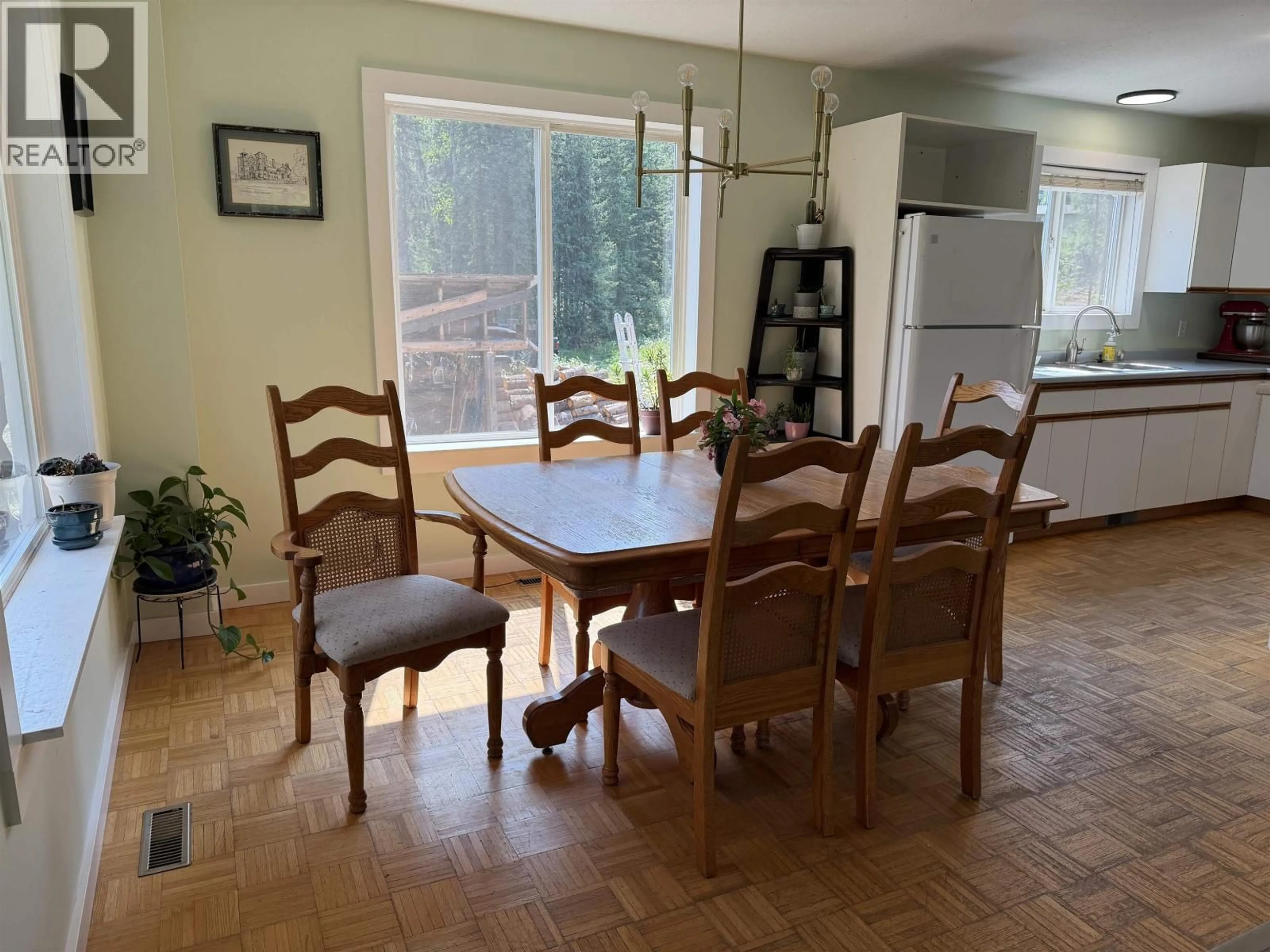 Dining room, wood/laminate floor for 12915 EAGLE ROAD, Telkwa British Columbia V0J2X3