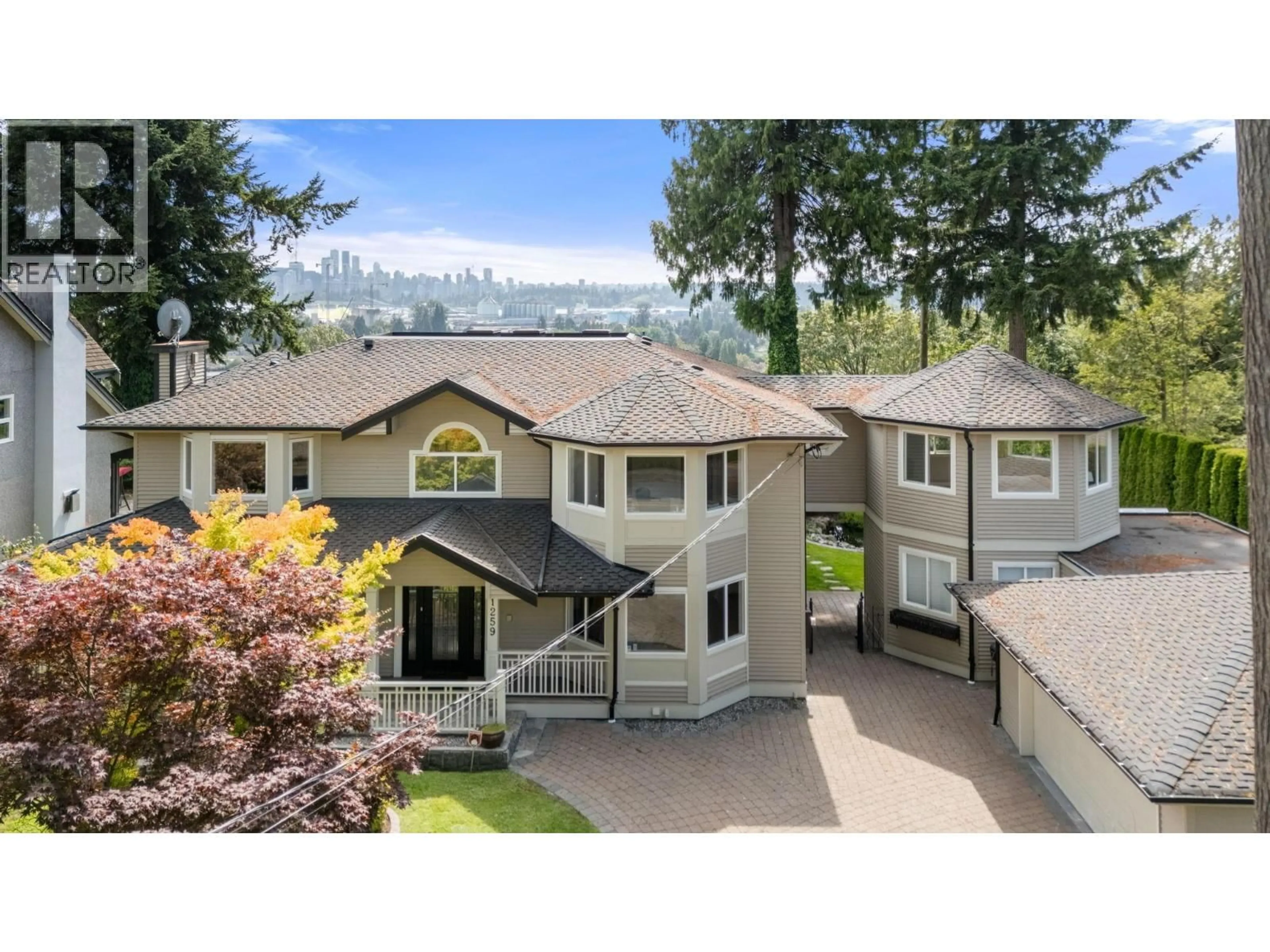 A pic from outside/outdoor area/front of a property/back of a property/a pic from drone, unknown for 1259 KEITH ROAD, North Vancouver British Columbia V7P1Y9