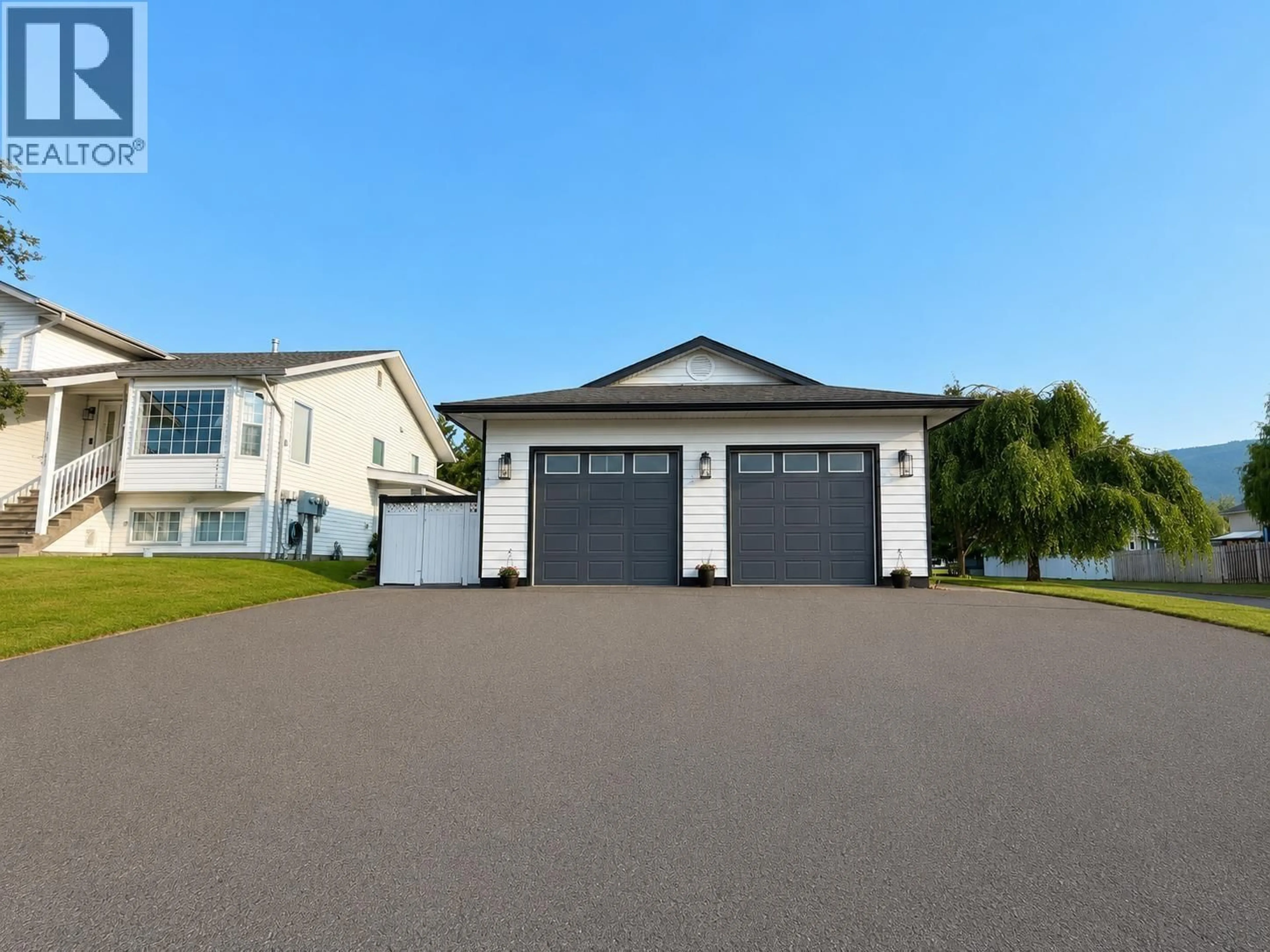 Home with vinyl exterior material, street for 1411 DRIFTWOOD CRESCENT, Smithers British Columbia V0J2N0