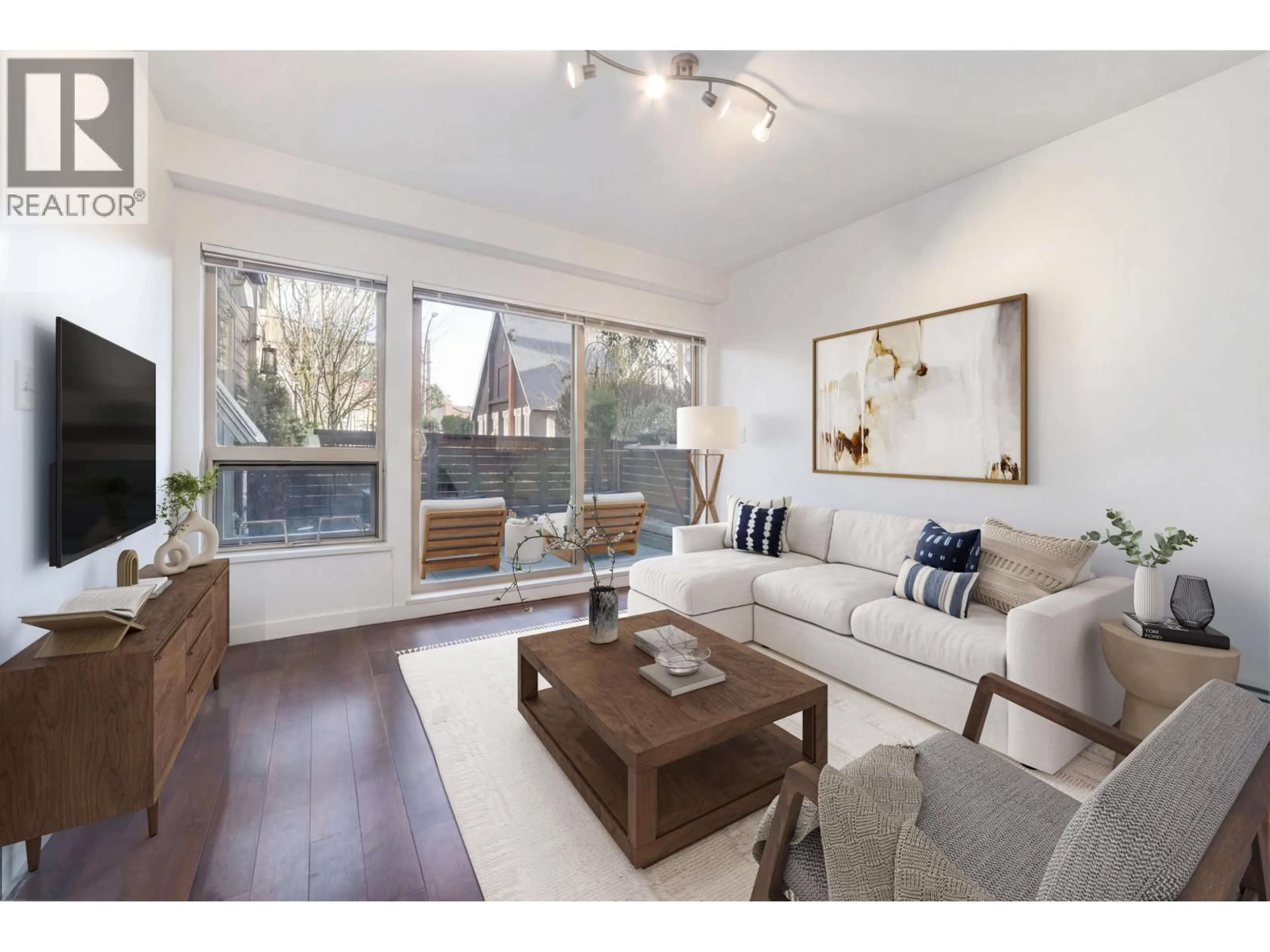 Living room with furniture, wood/laminate floor for 109 - 1033 ST. GEORGES AVENUE, North Vancouver British Columbia V7L3H5