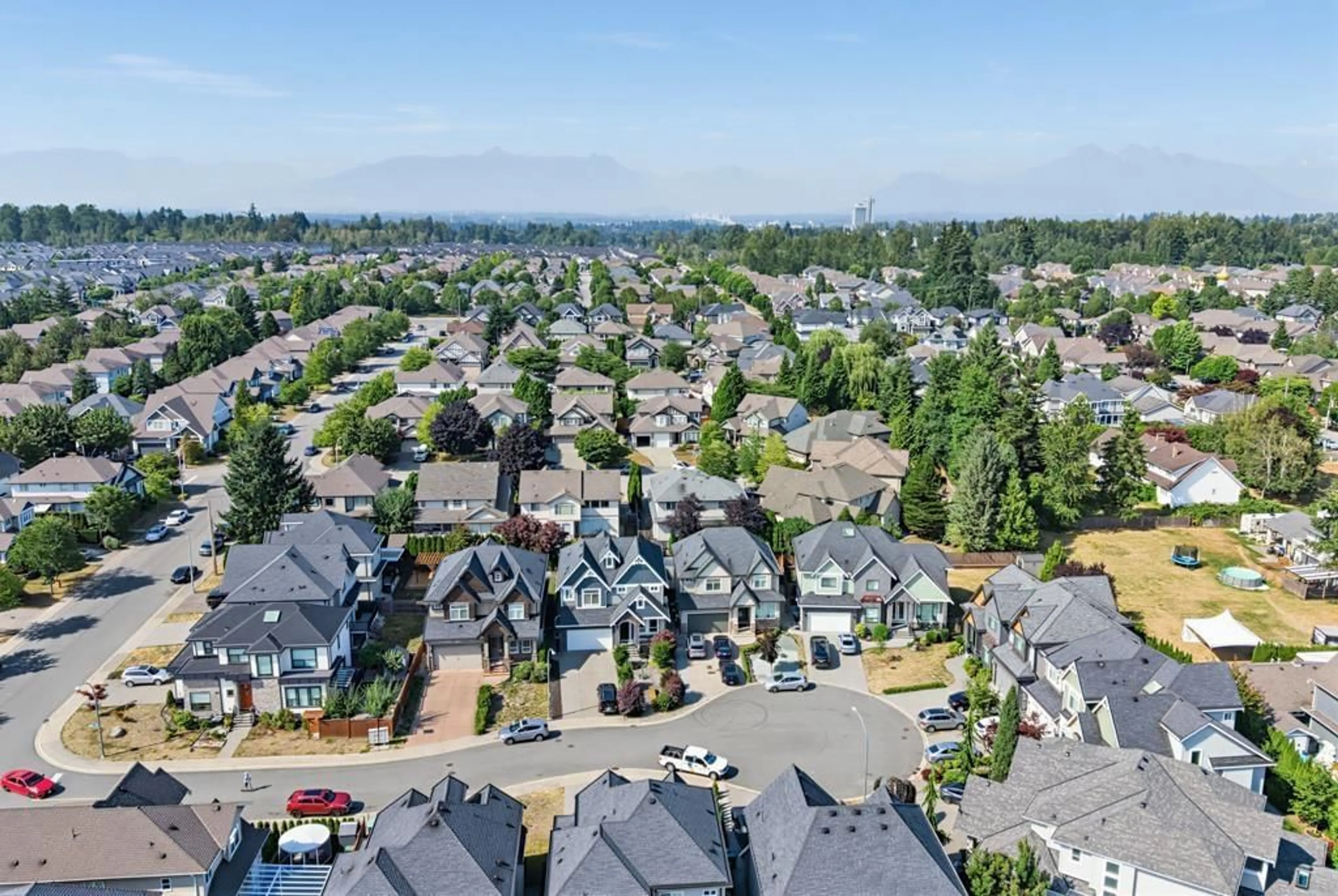 A pic from outside/outdoor area/front of a property/back of a property/a pic from drone, mountain view for 19675 70A AVENUE, Langley British Columbia V2Y0N6