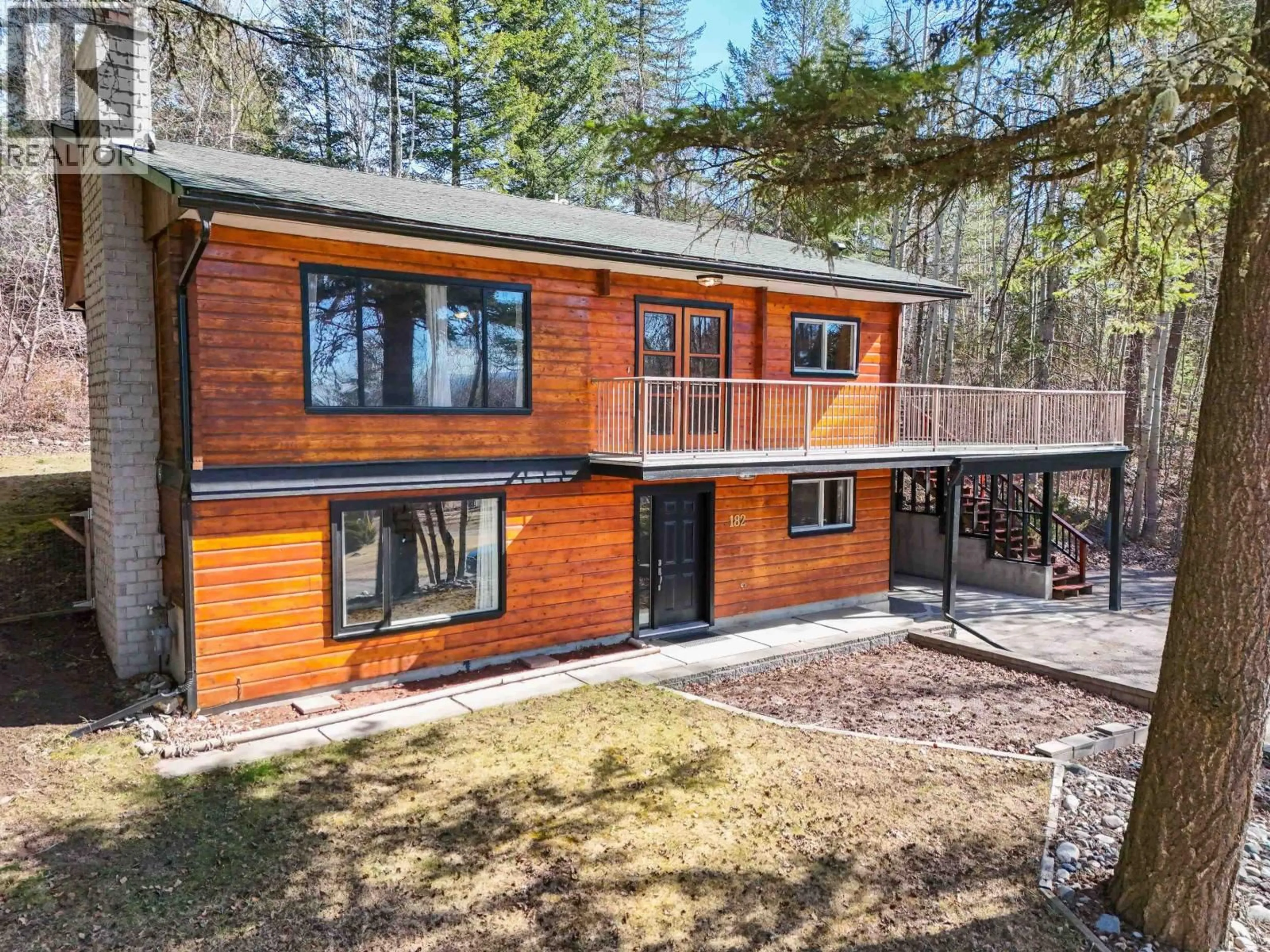 A pic from outside/outdoor area/front of a property/back of a property/a pic from drone, forest/trees view for 182 COACH ROAD, Quesnel British Columbia V2J4E8