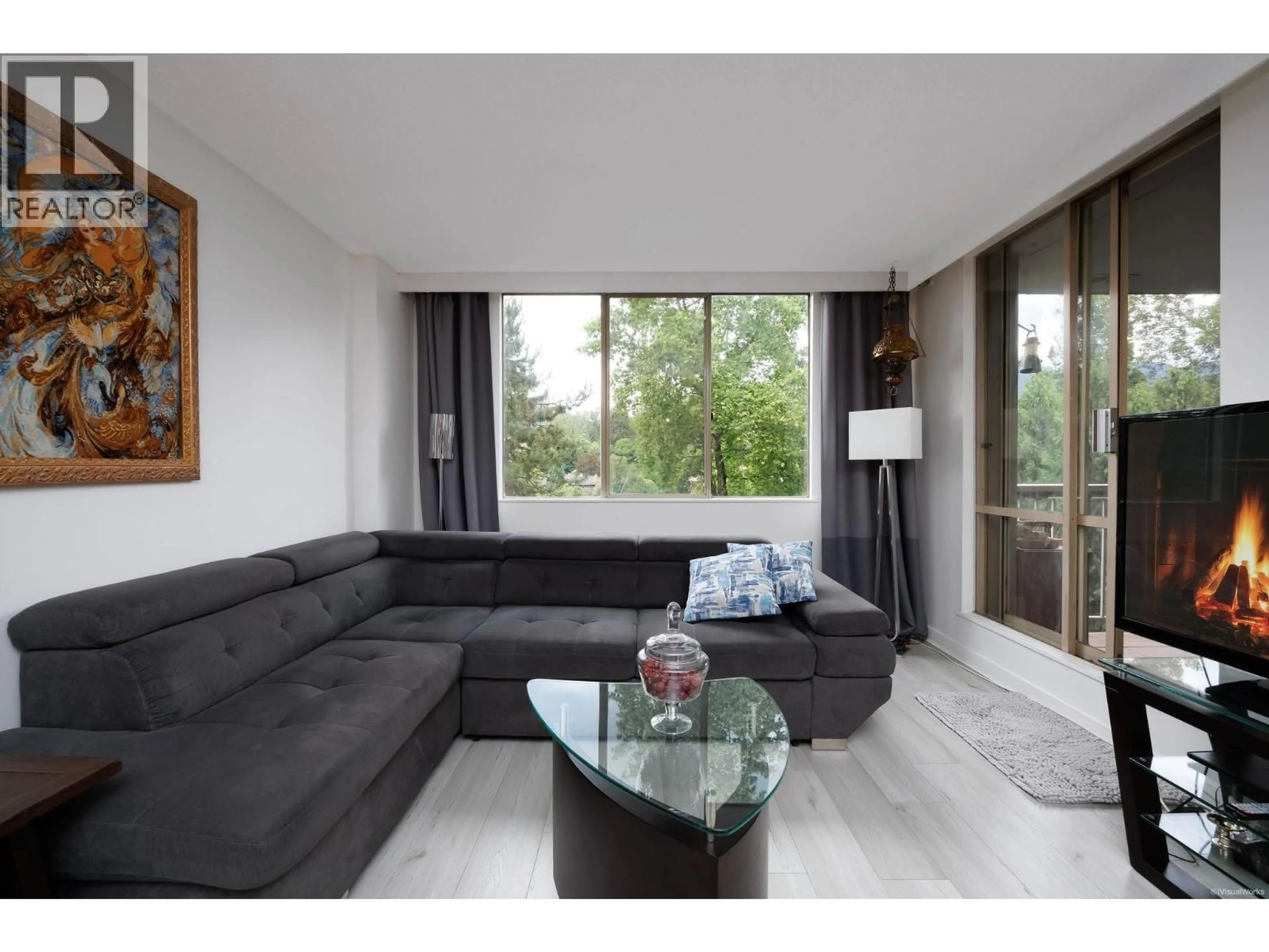 Living room with furniture, wood/laminate floor for 1001 - 2012 FULLERTON AVENUE, North Vancouver British Columbia V7P3E3