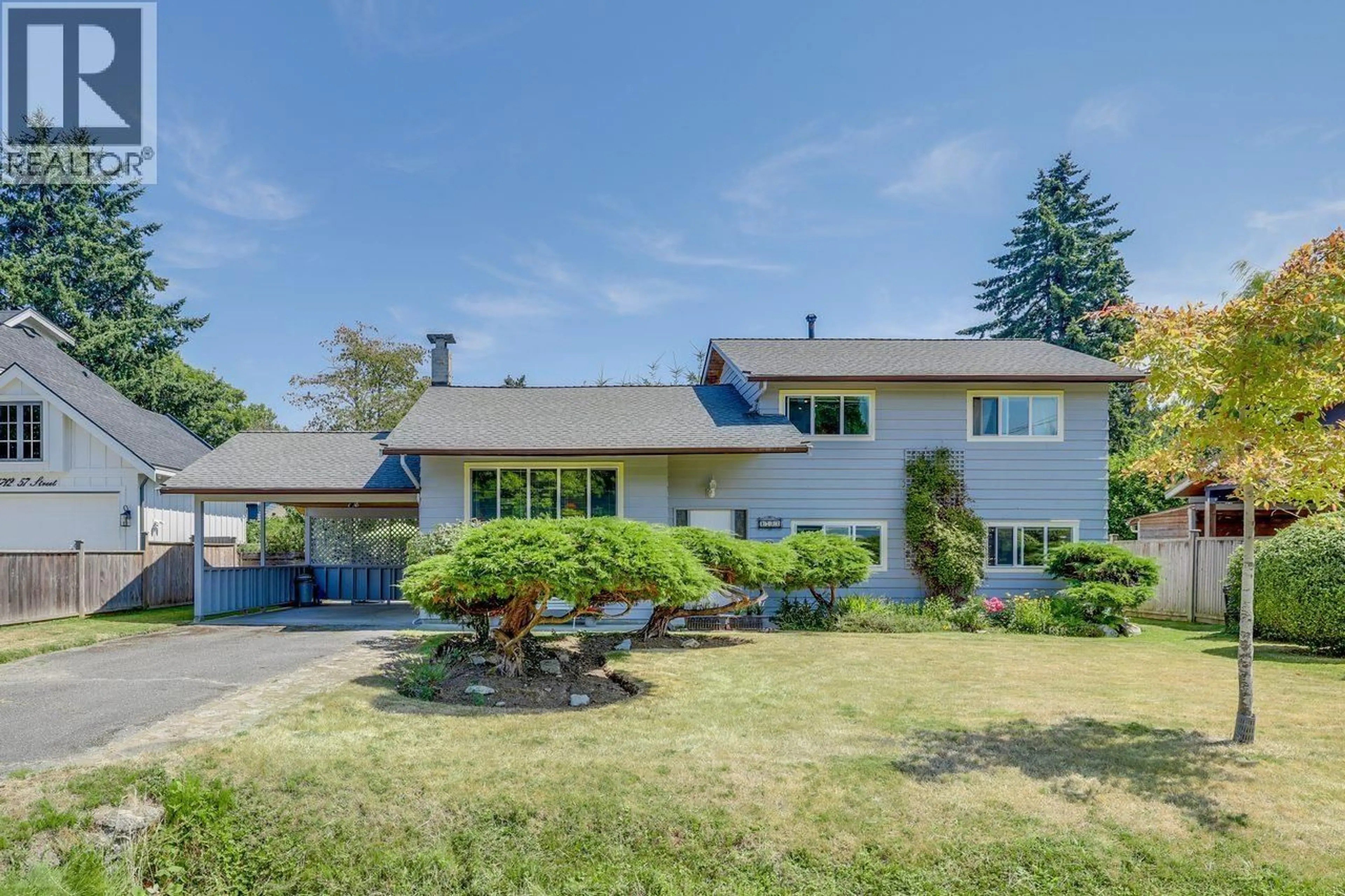 Home with vinyl exterior material, street for 1702 57TH STREET, Delta British Columbia V4L1Y4
