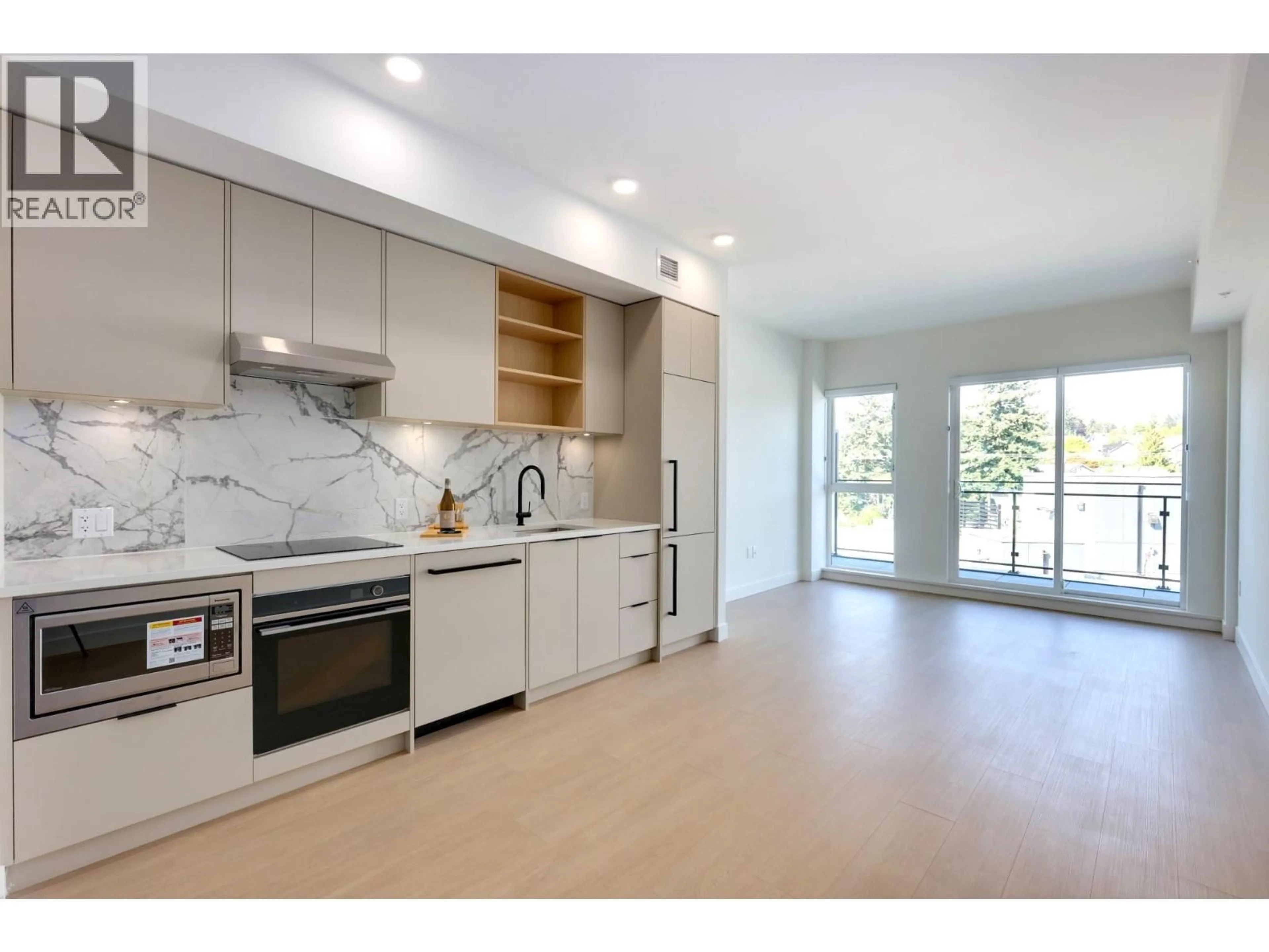 Open concept kitchen, unknown for 663 - 422 3RD STREET, North Vancouver British Columbia V7L0K1