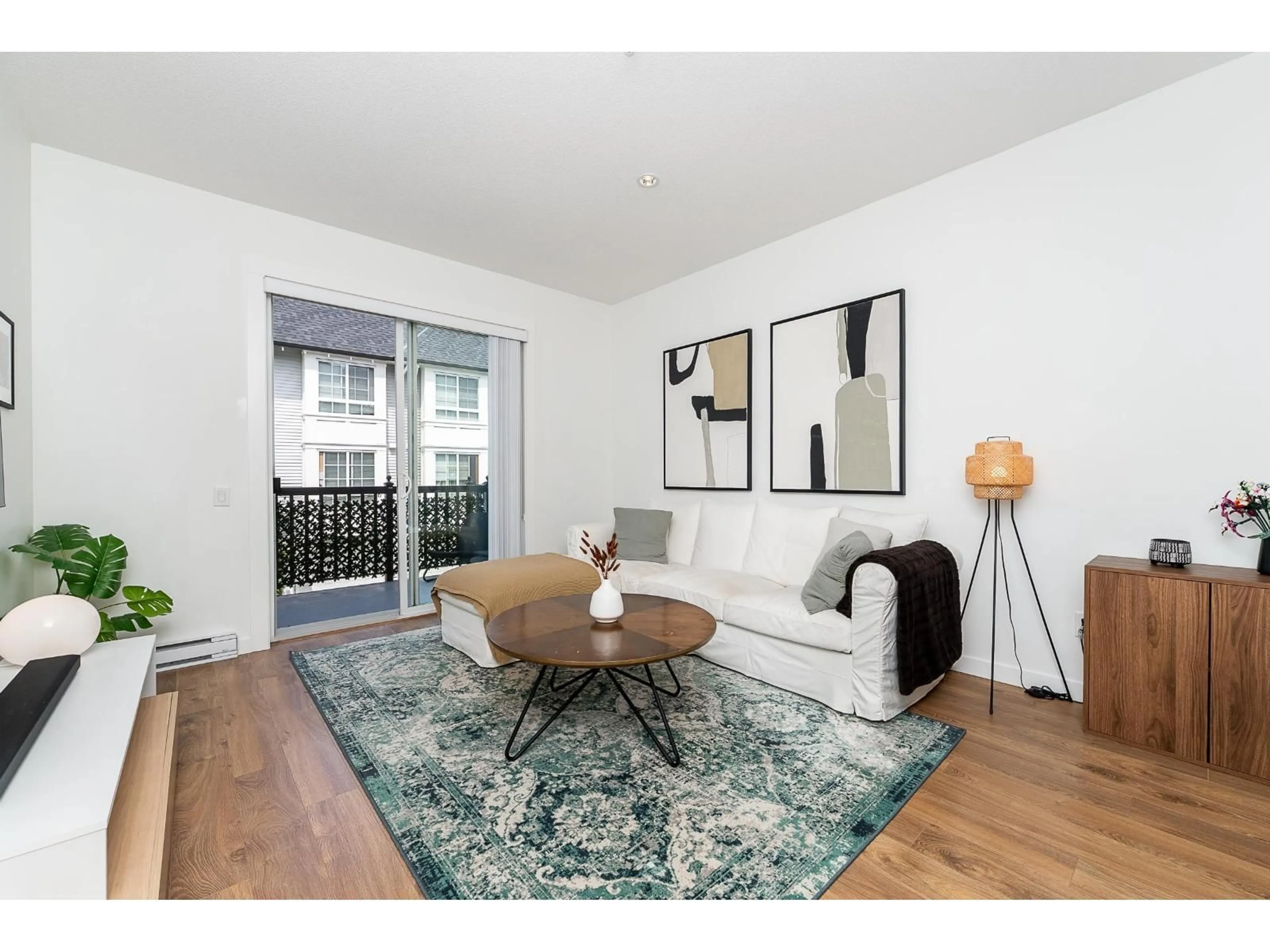 Living room with furniture, wood/laminate floor for 59 - 8476 207A STREET, Langley British Columbia V2Y0S6