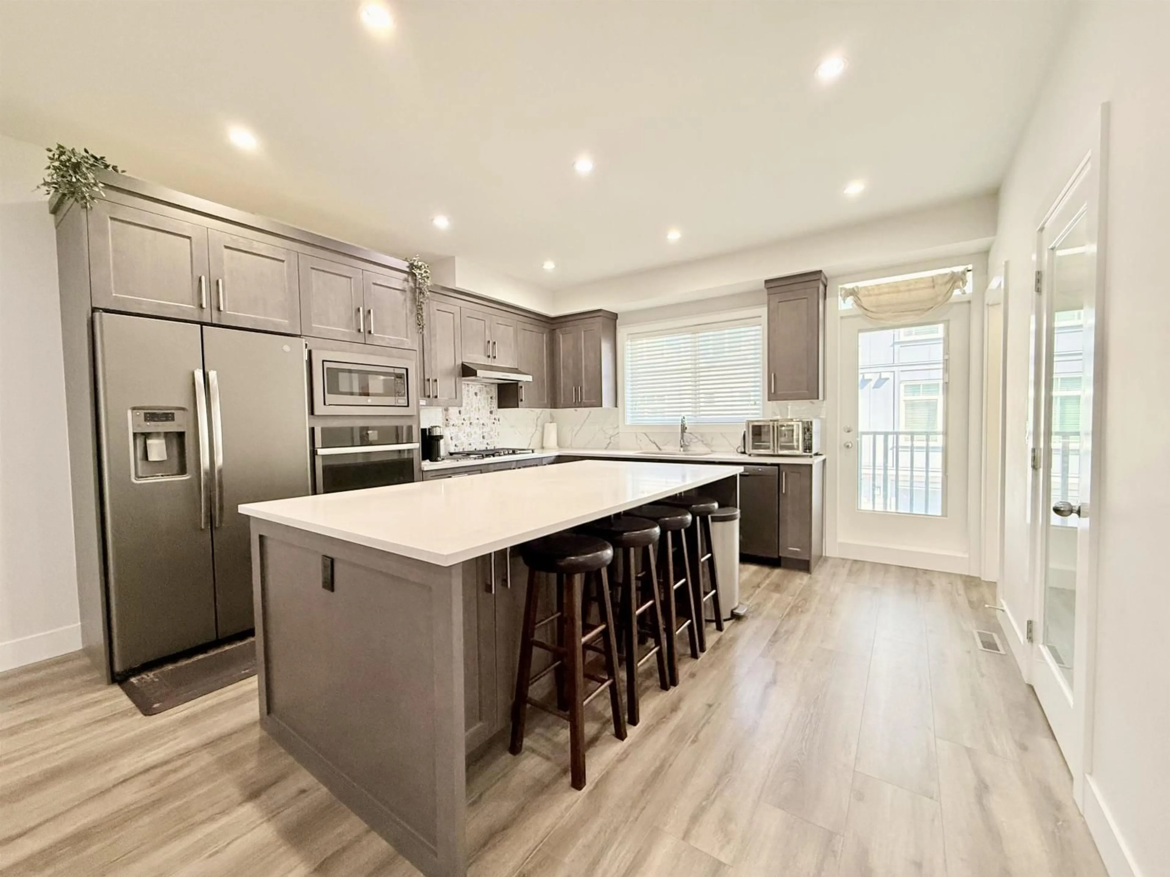 Open concept kitchen, unknown for 3 - 19239 70 AVENUE, Surrey British Columbia V4N6S8