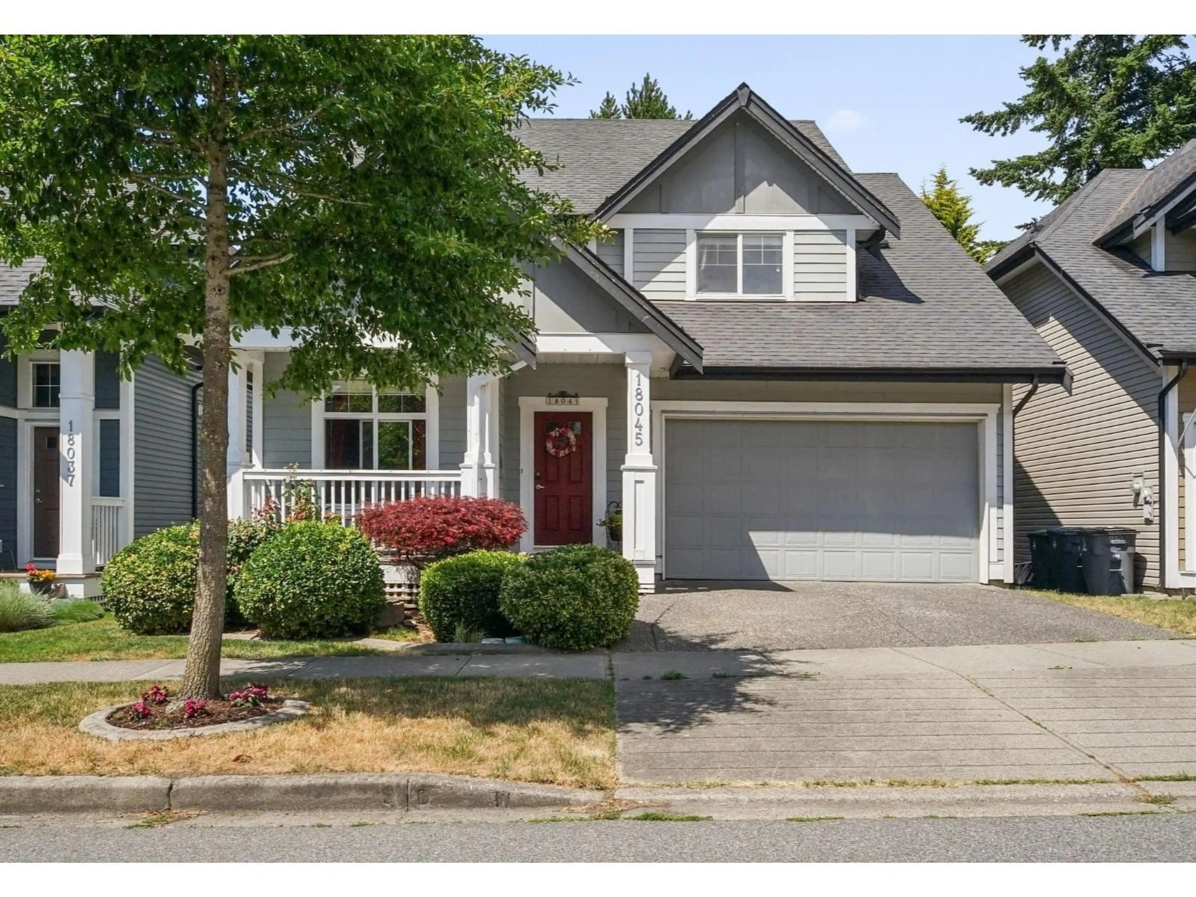 Home with vinyl exterior material, street for 18045 70A AVENUE, Surrey British Columbia V3S7C5
