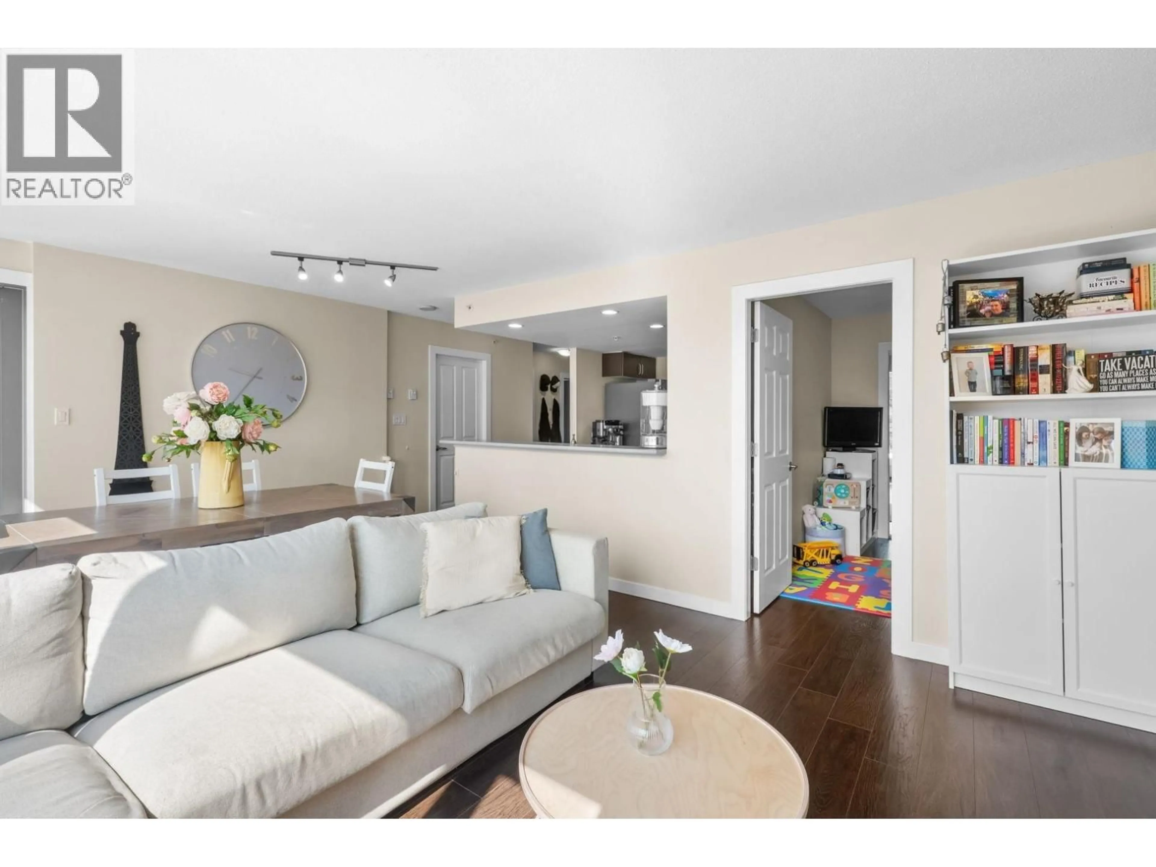 Living room with furniture, wood/laminate floor for 902 - 295 GUILDFORD WAY, Port Moody British Columbia V3H5N3