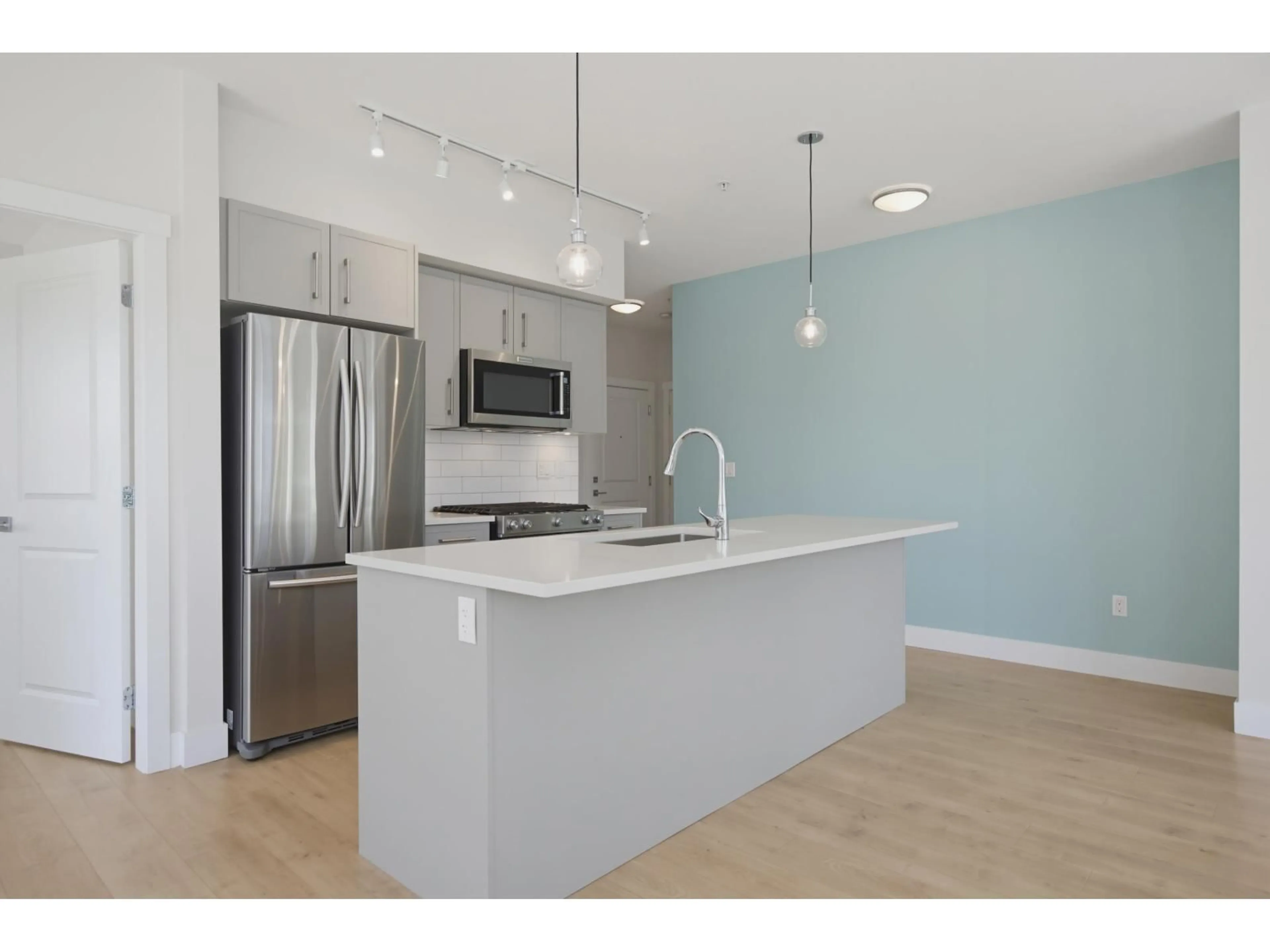 Open concept kitchen, unknown for 202 - 22136 49 AVENUE, Langley British Columbia V3A0M8