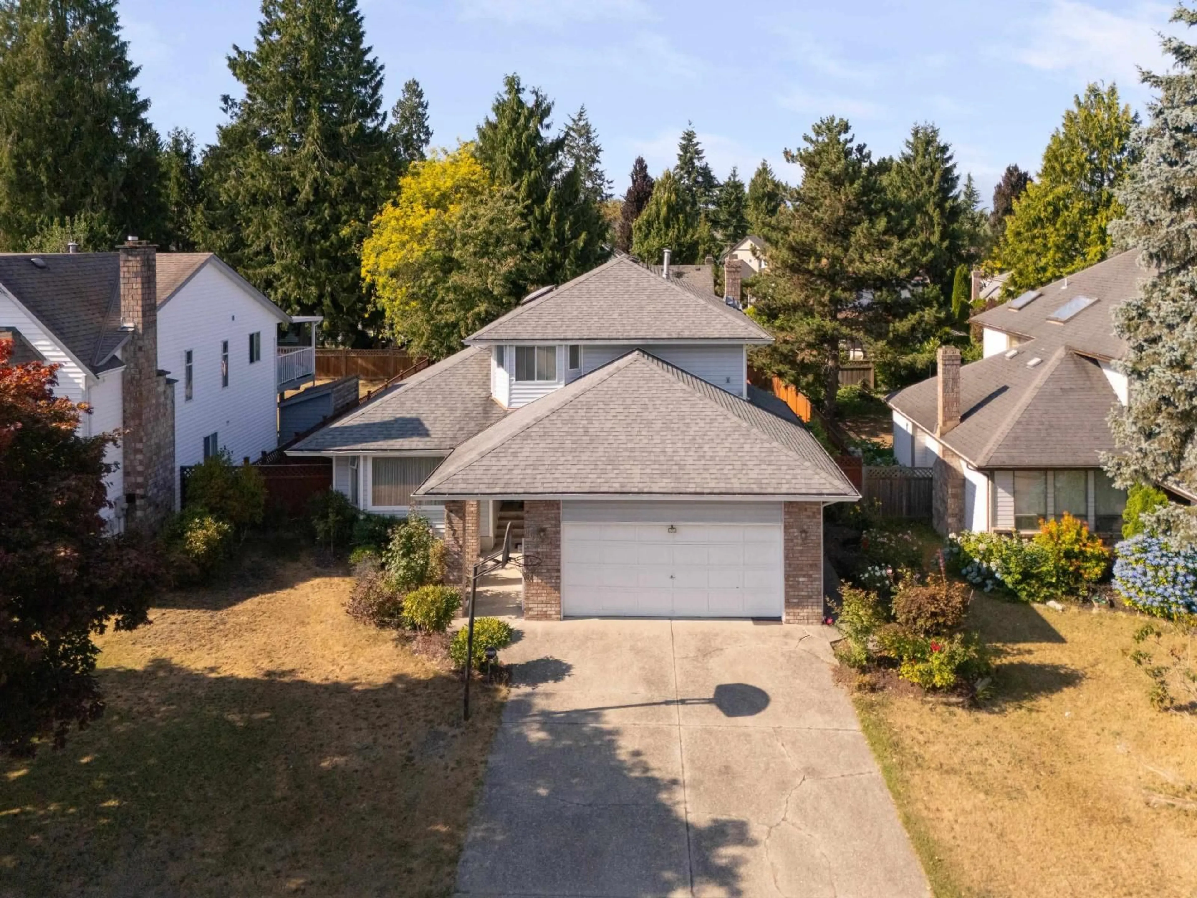 A pic from outside/outdoor area/front of a property/back of a property/a pic from drone, street for 15753 98 AVENUE, Surrey British Columbia V4N2V5