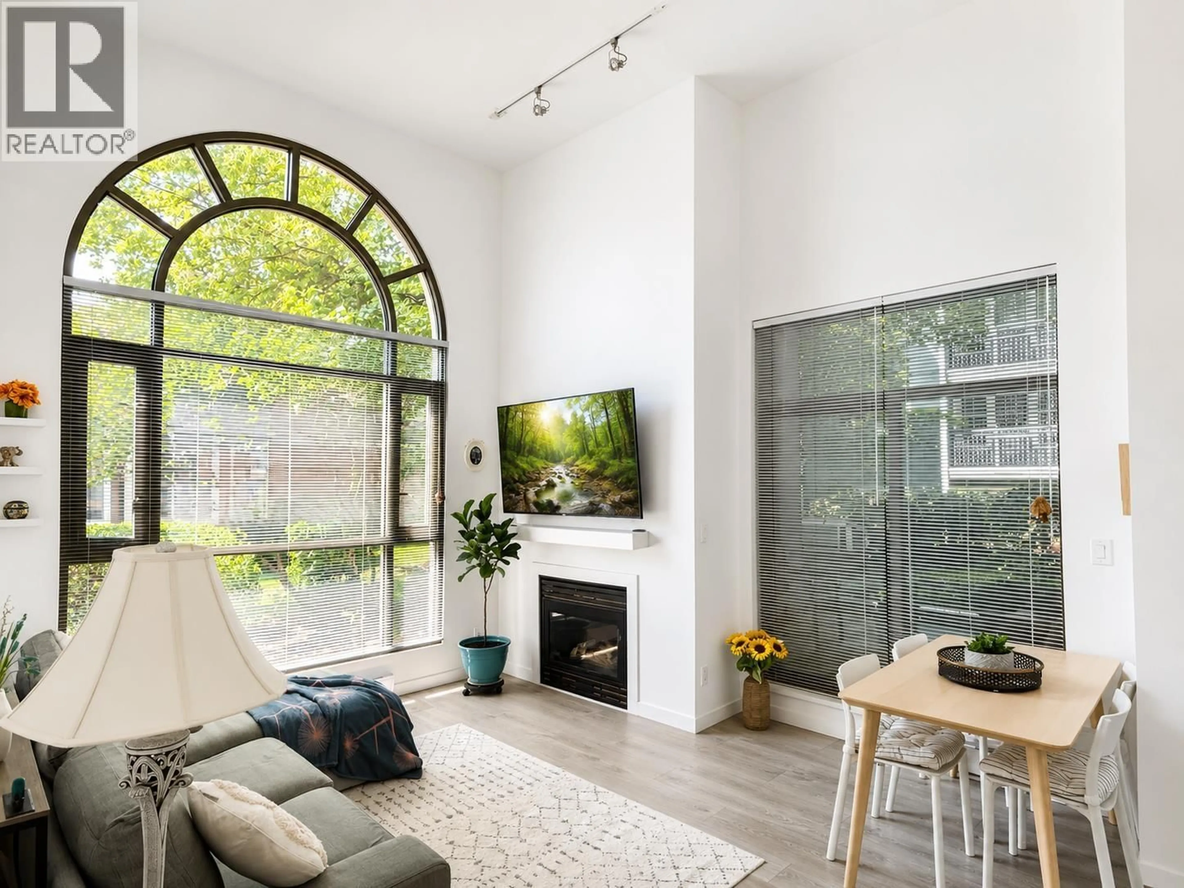 Living room with furniture, unknown for 101 - 3070 GUILDFORD WAY, Coquitlam British Columbia V3B7R8