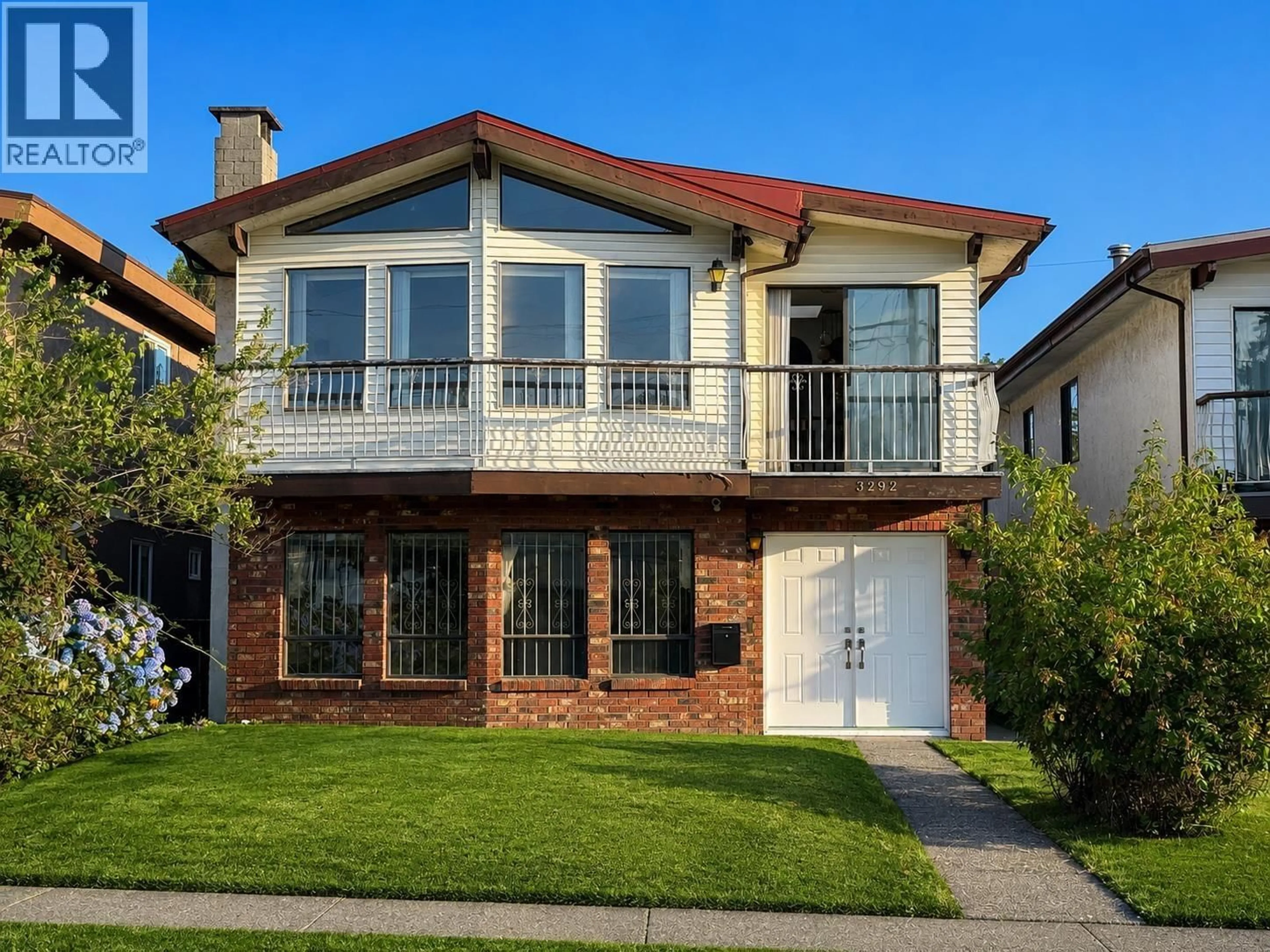 Home with brick exterior material, street for 3292 43RD AVENUE, Vancouver British Columbia V5R2Z9