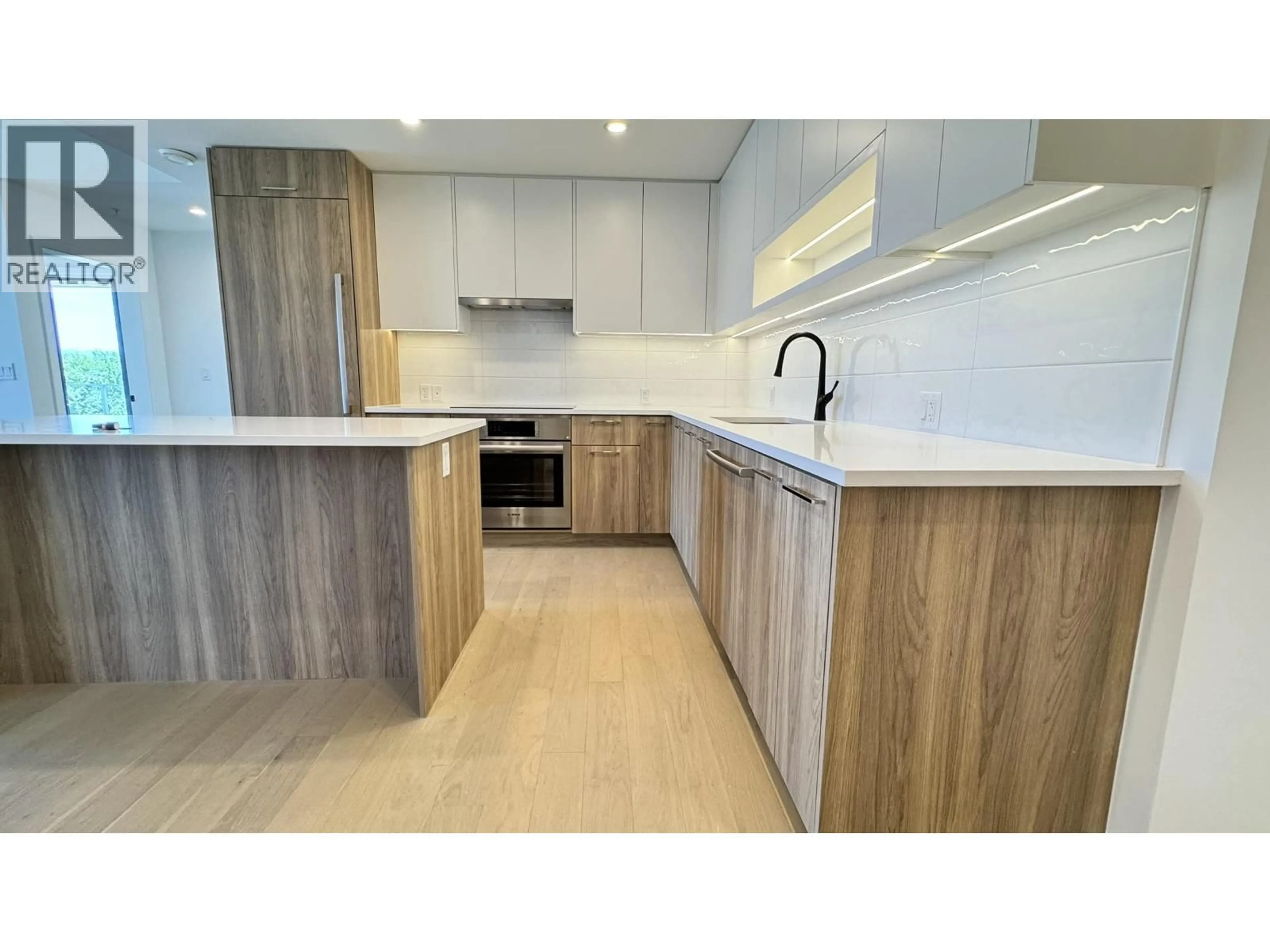 Standard kitchen, wood/laminate floor for 605 - 8398 OAK STREET, Vancouver British Columbia V6P0L9