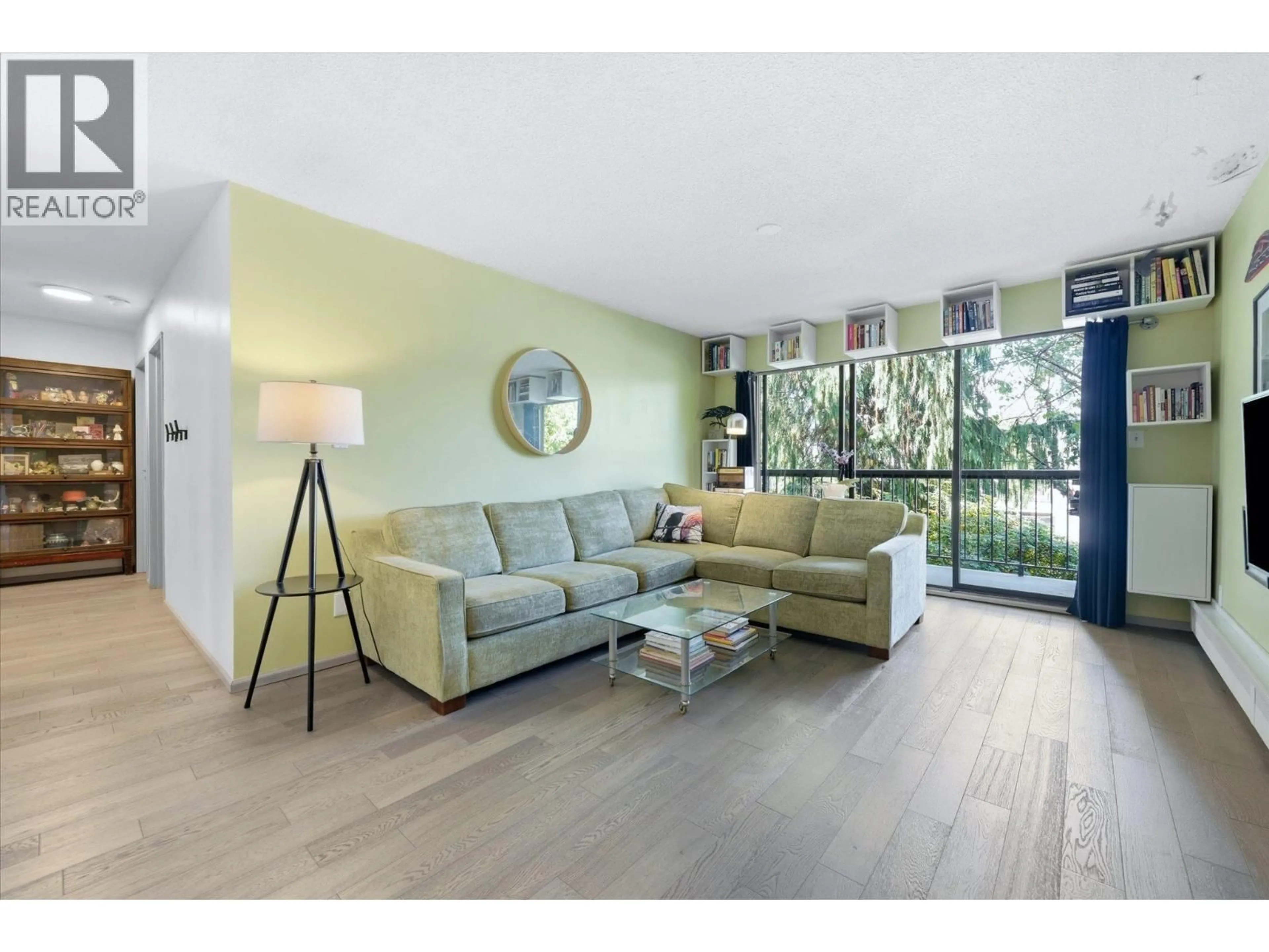 Living room with furniture, wood/laminate floor for 201 - 1622 FRANCES STREET, Vancouver British Columbia V5L1Z4
