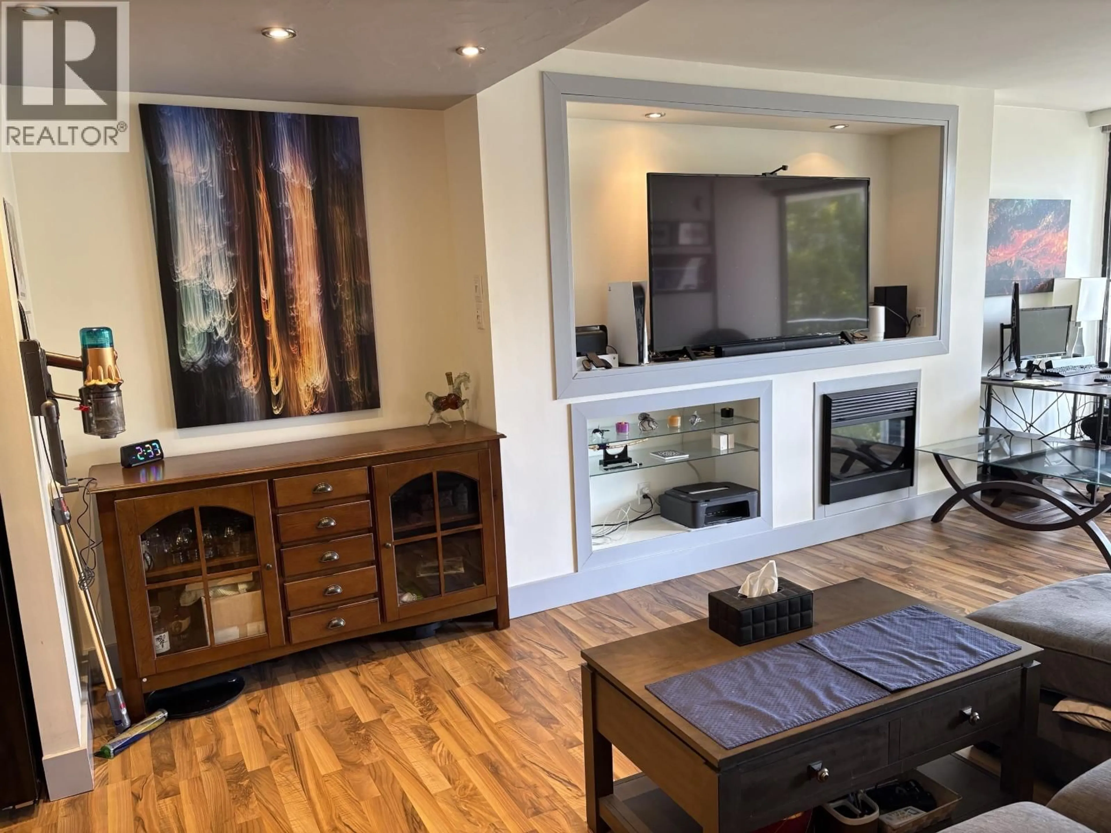 Living room with furniture, wood/laminate floor for 206 - 710 SEVENTH AVENUE, New Westminster British Columbia V3M5V3