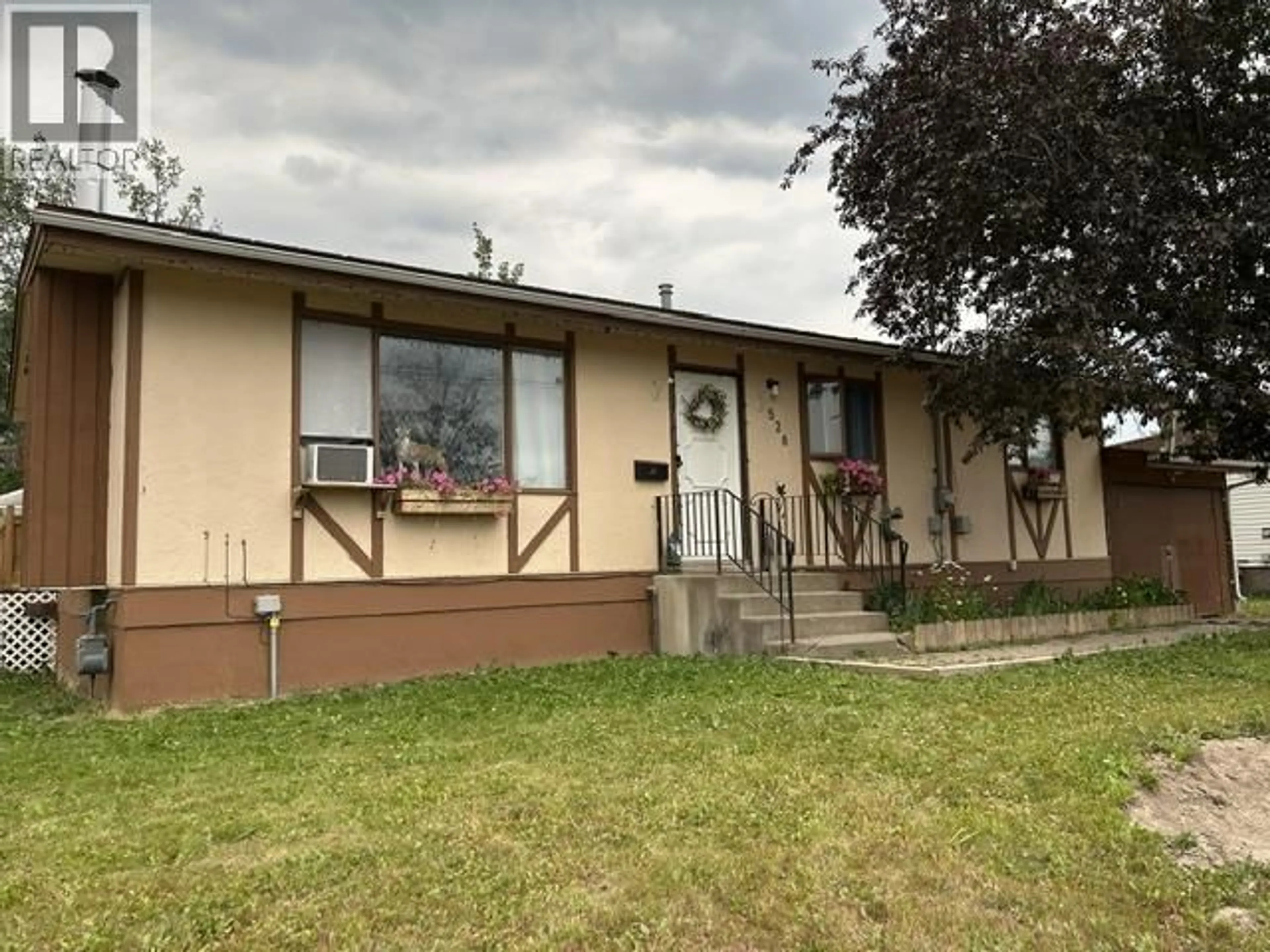 A pic from outside/outdoor area/front of a property/back of a property/a pic from drone, building for 528 TUNASA DRIVE, Fraser Lake British Columbia V0J1S0
