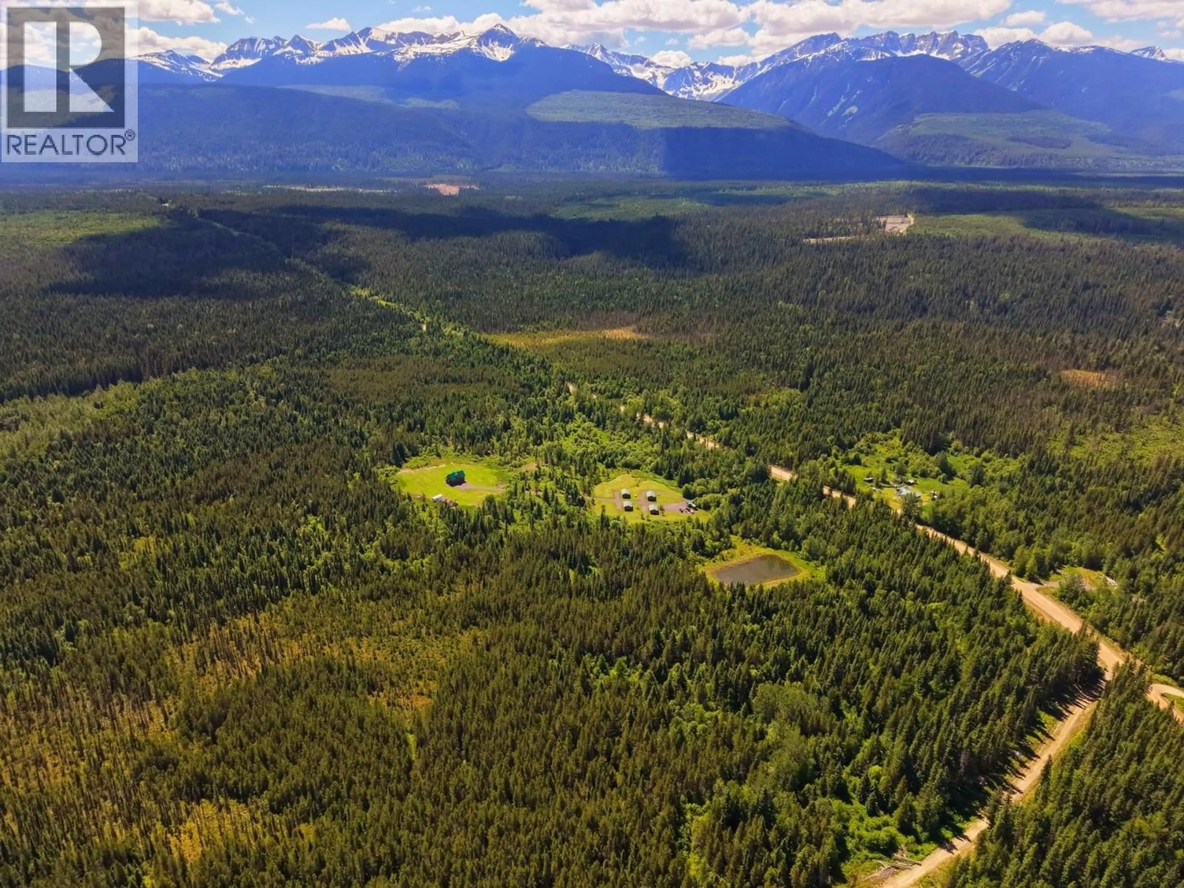 A pic from outside/outdoor area/front of a property/back of a property/a pic from drone, forest/trees view for 8170 LOOS ROAD, McBride British Columbia V0J3E0