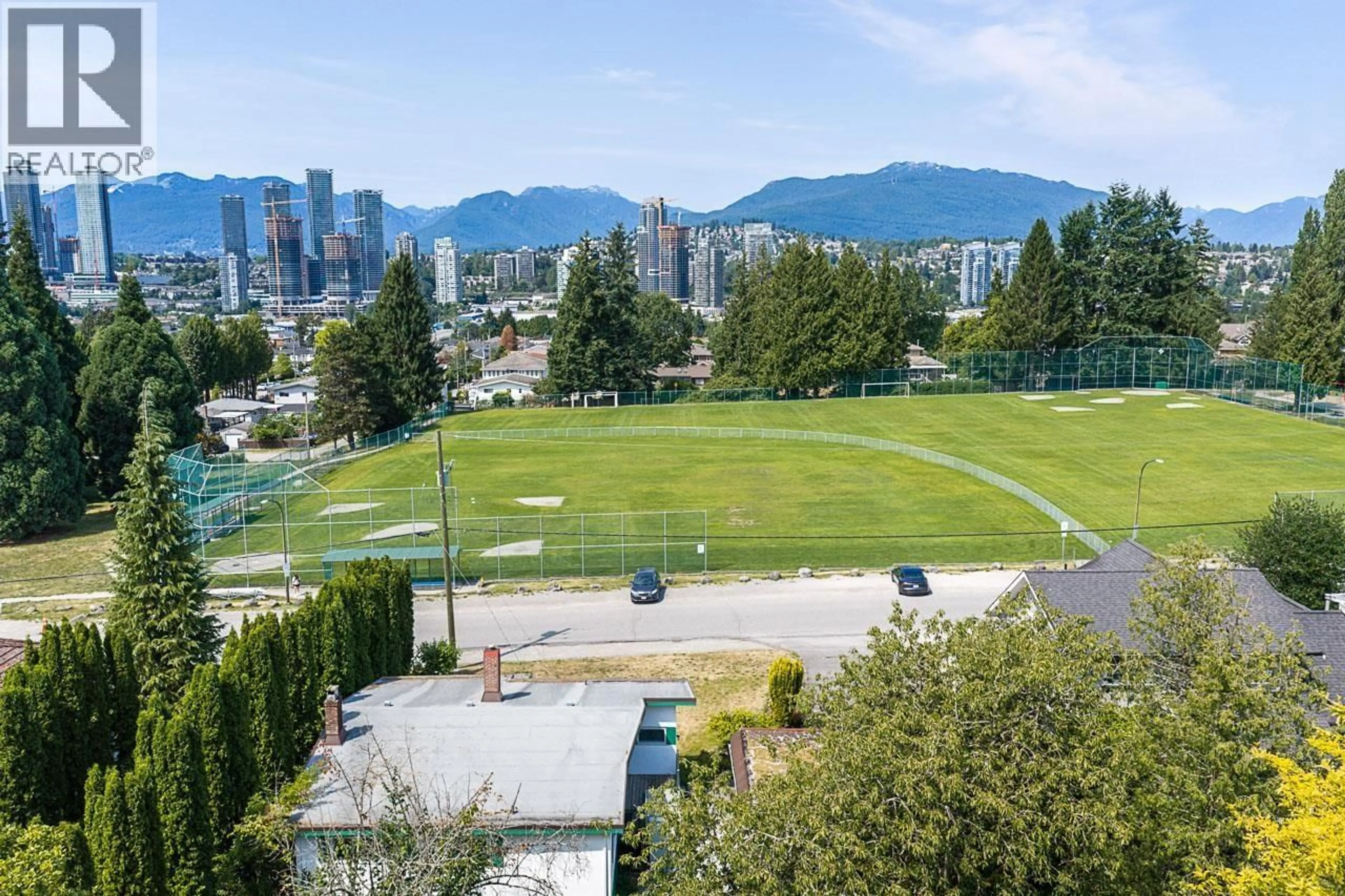 A pic from outside/outdoor area/front of a property/back of a property/a pic from drone, mountain view for 5288 HARDWICK STREET, Burnaby British Columbia V5G1P9
