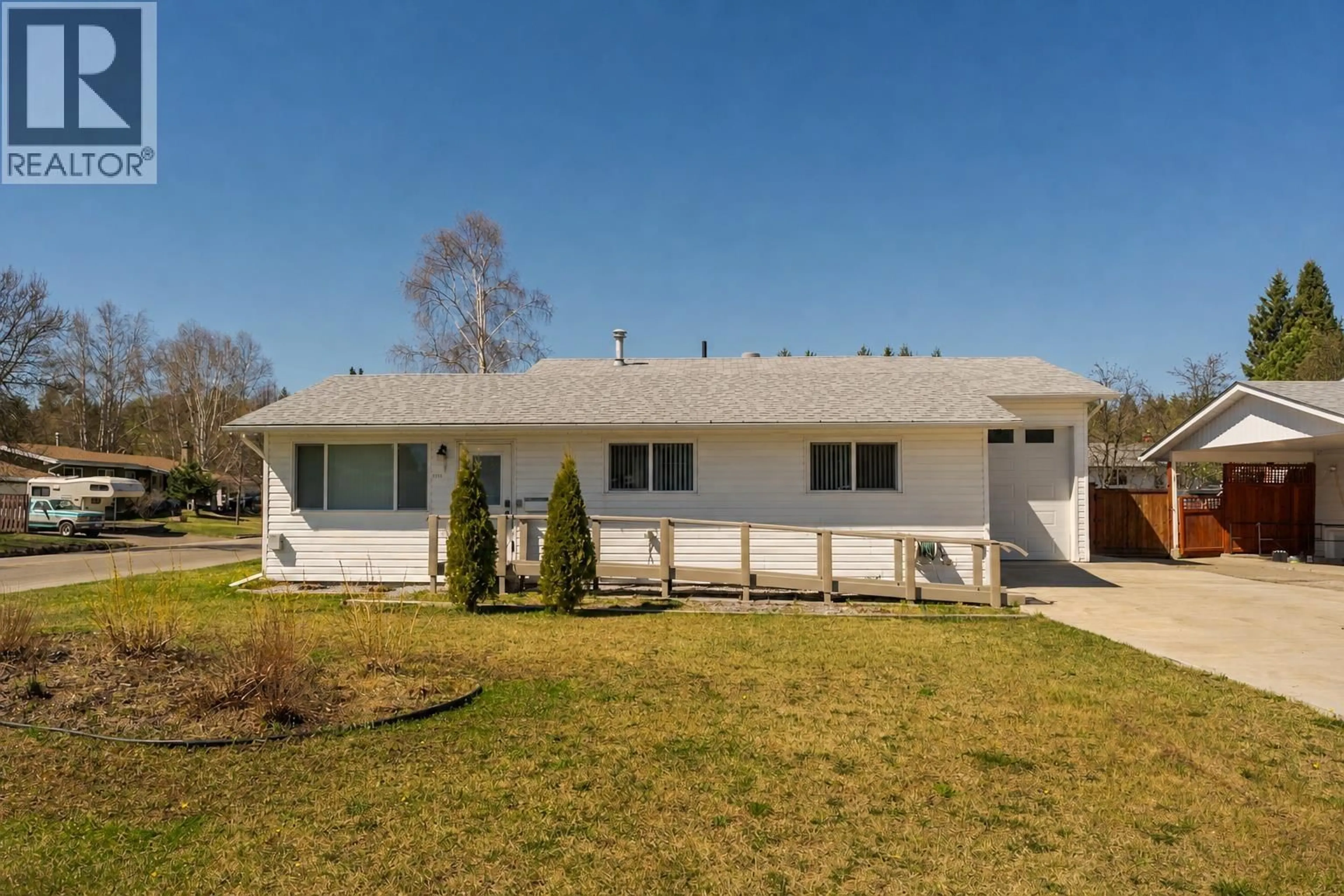 Home with vinyl exterior material, street for 7759 QUEENS CRESCENT, Prince George British Columbia V2N3H3