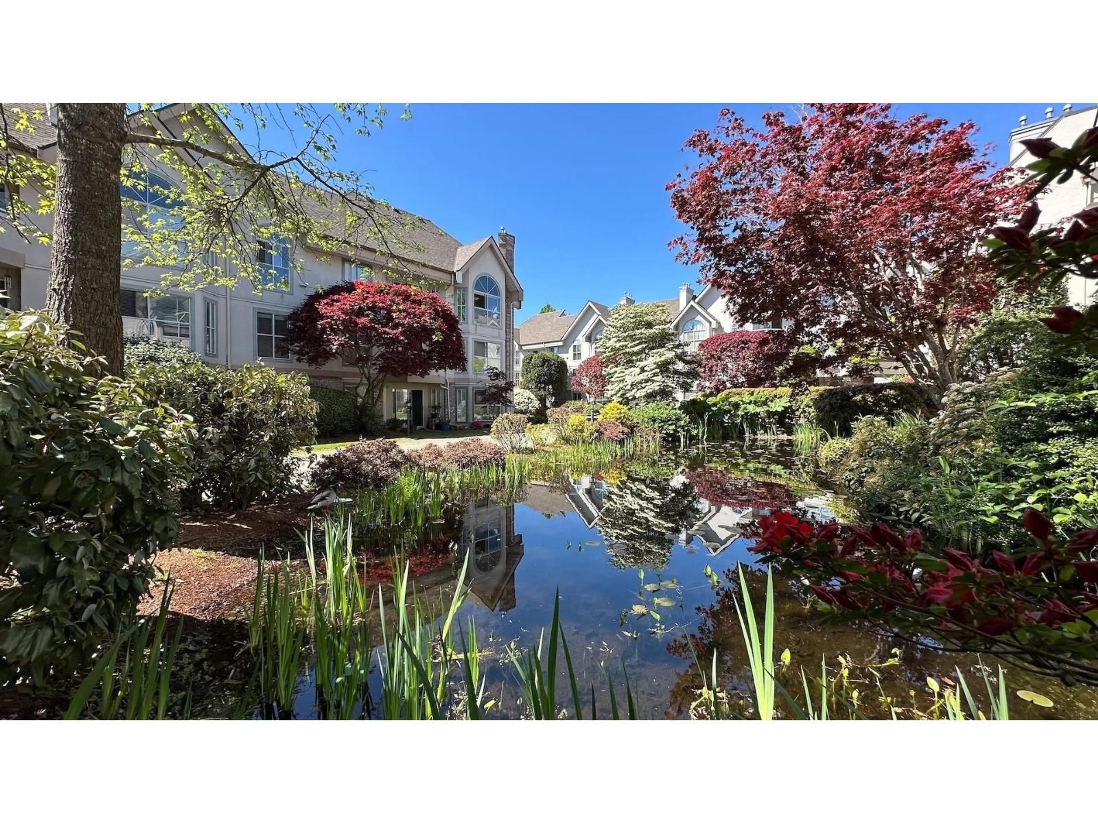 A pic from outside/outdoor area/front of a property/back of a property/a pic from drone, water/lake/river/ocean view for 110 - 7171 121 STREET, Surrey British Columbia V3W1G9