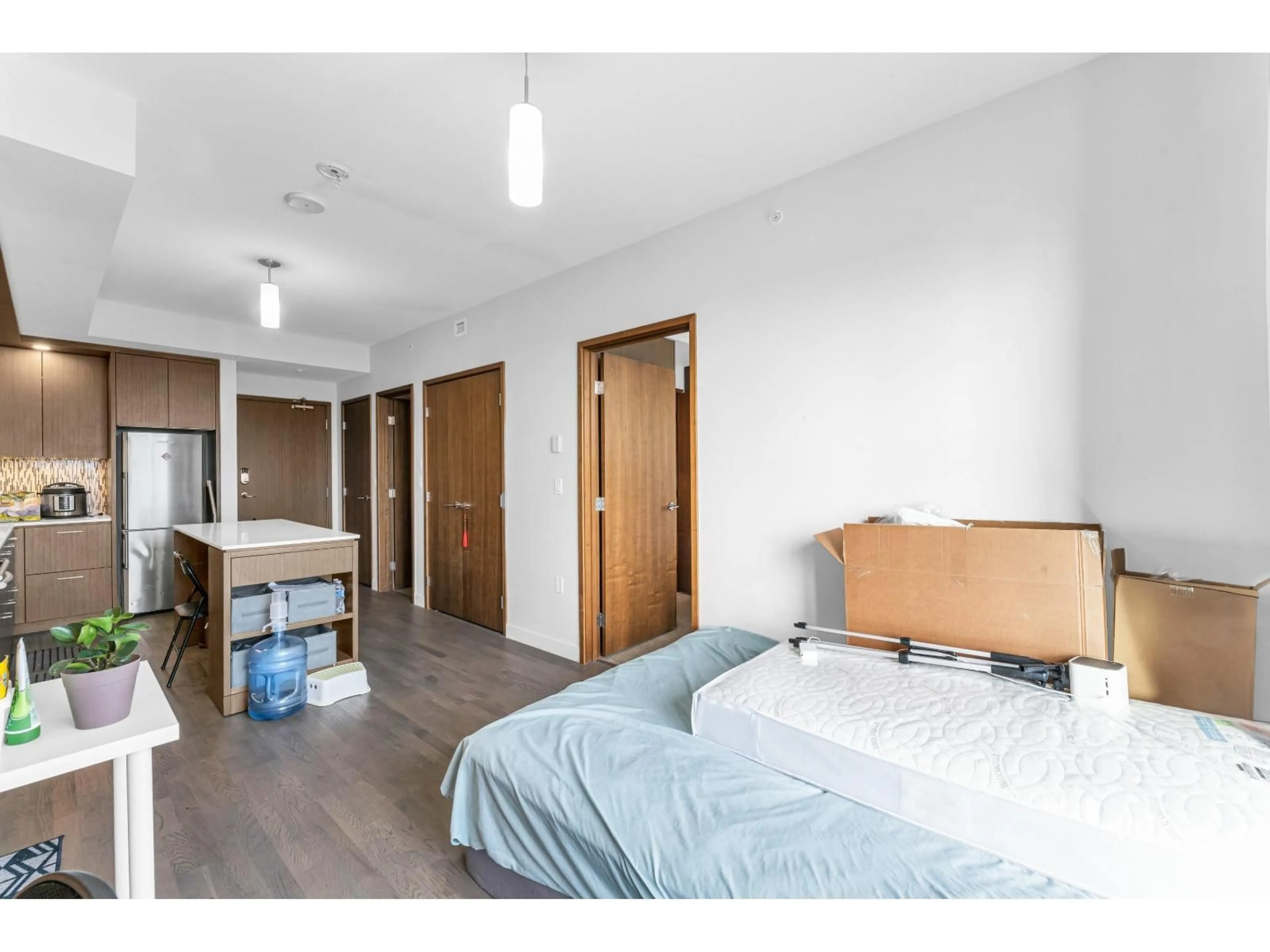 Bedroom with bed, wood/laminate floor for 2702 - 13495 CENTRAL AVENUE, Surrey British Columbia V3T0K2