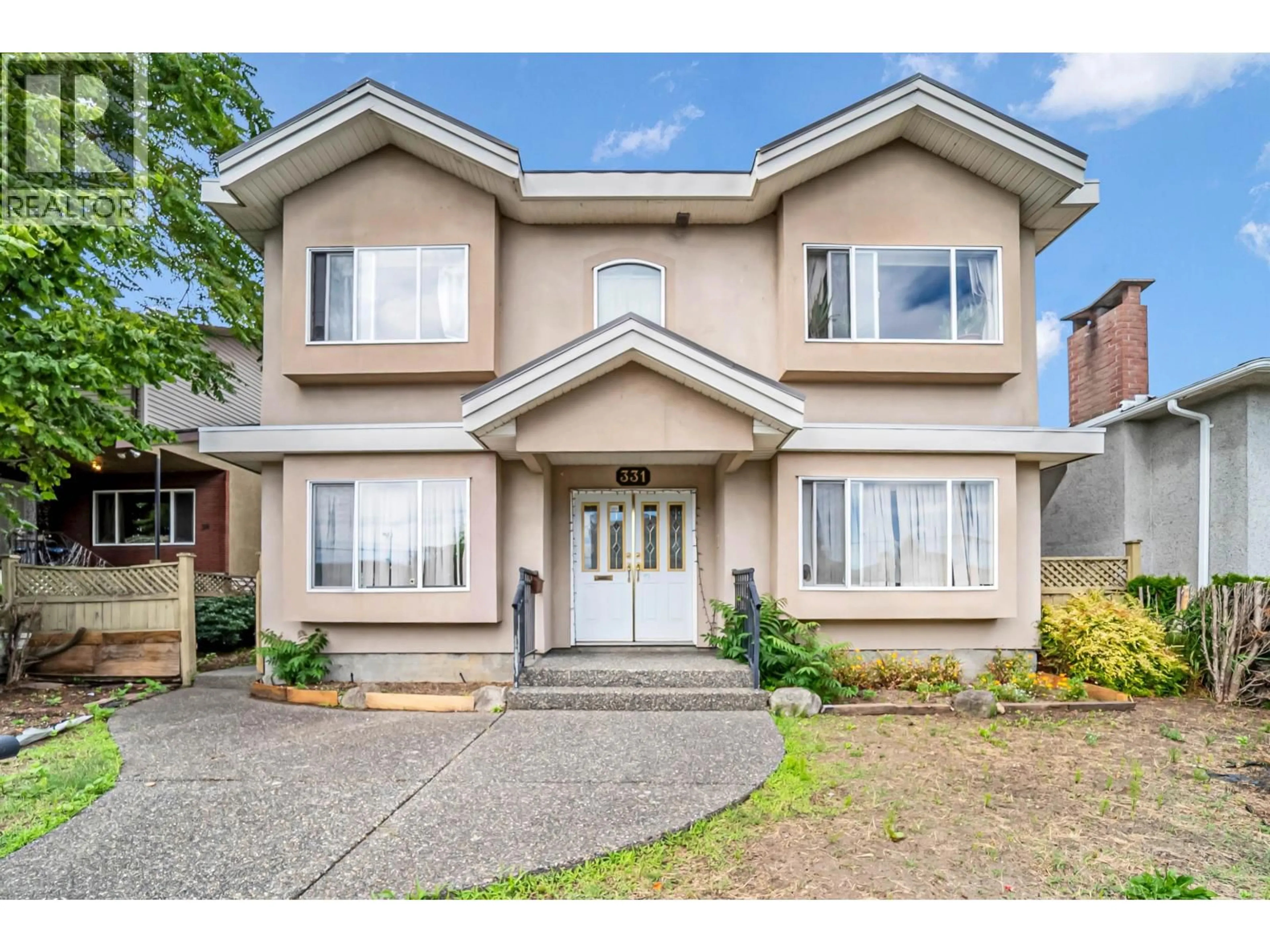 Home with brick exterior material, street for 331 61ST AVENUE, Vancouver British Columbia V5X2B5