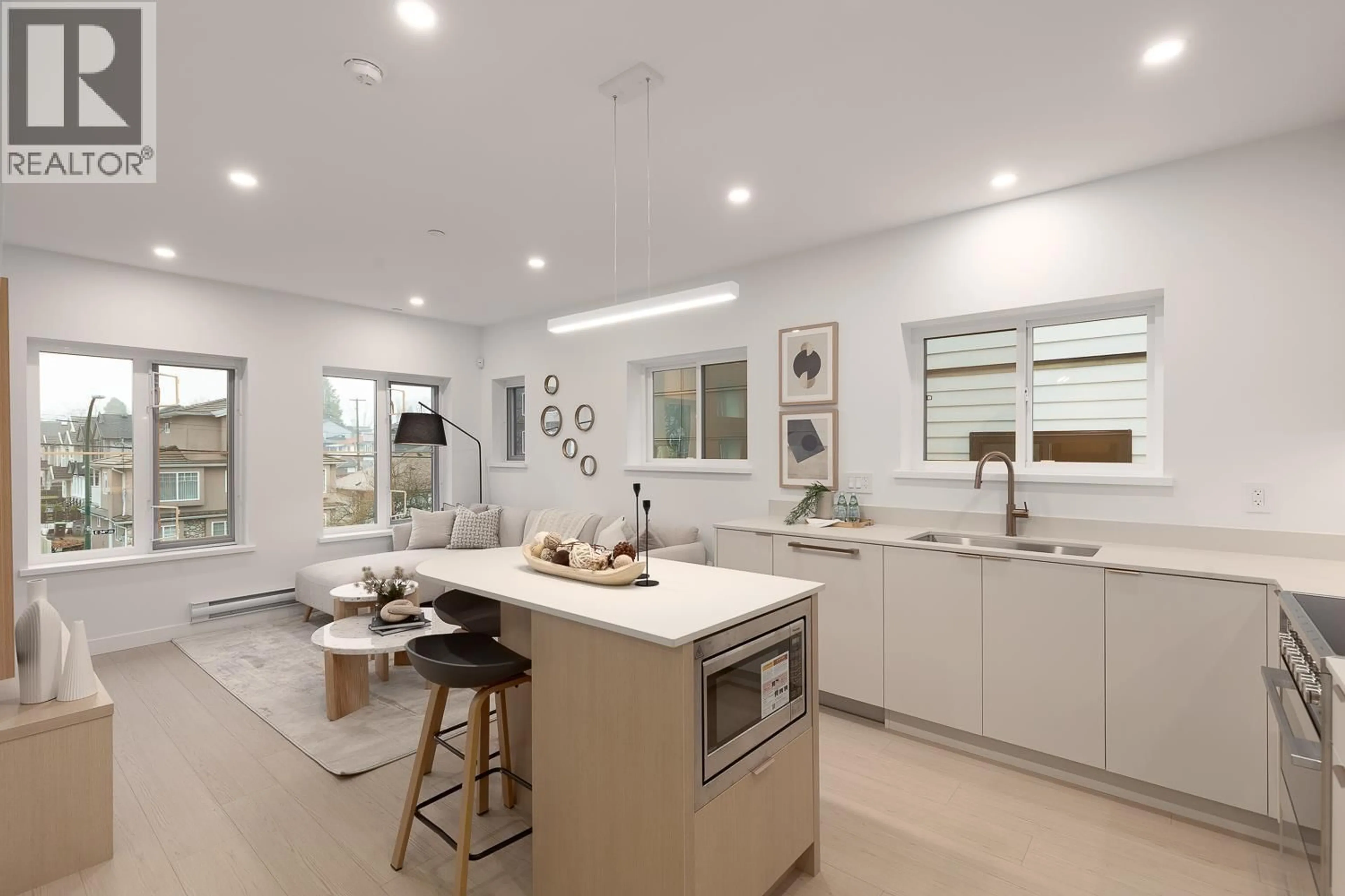 Open concept kitchen, ceramic/tile floor for 205 - 2329 34TH AVENUE, Vancouver British Columbia V5R2S6