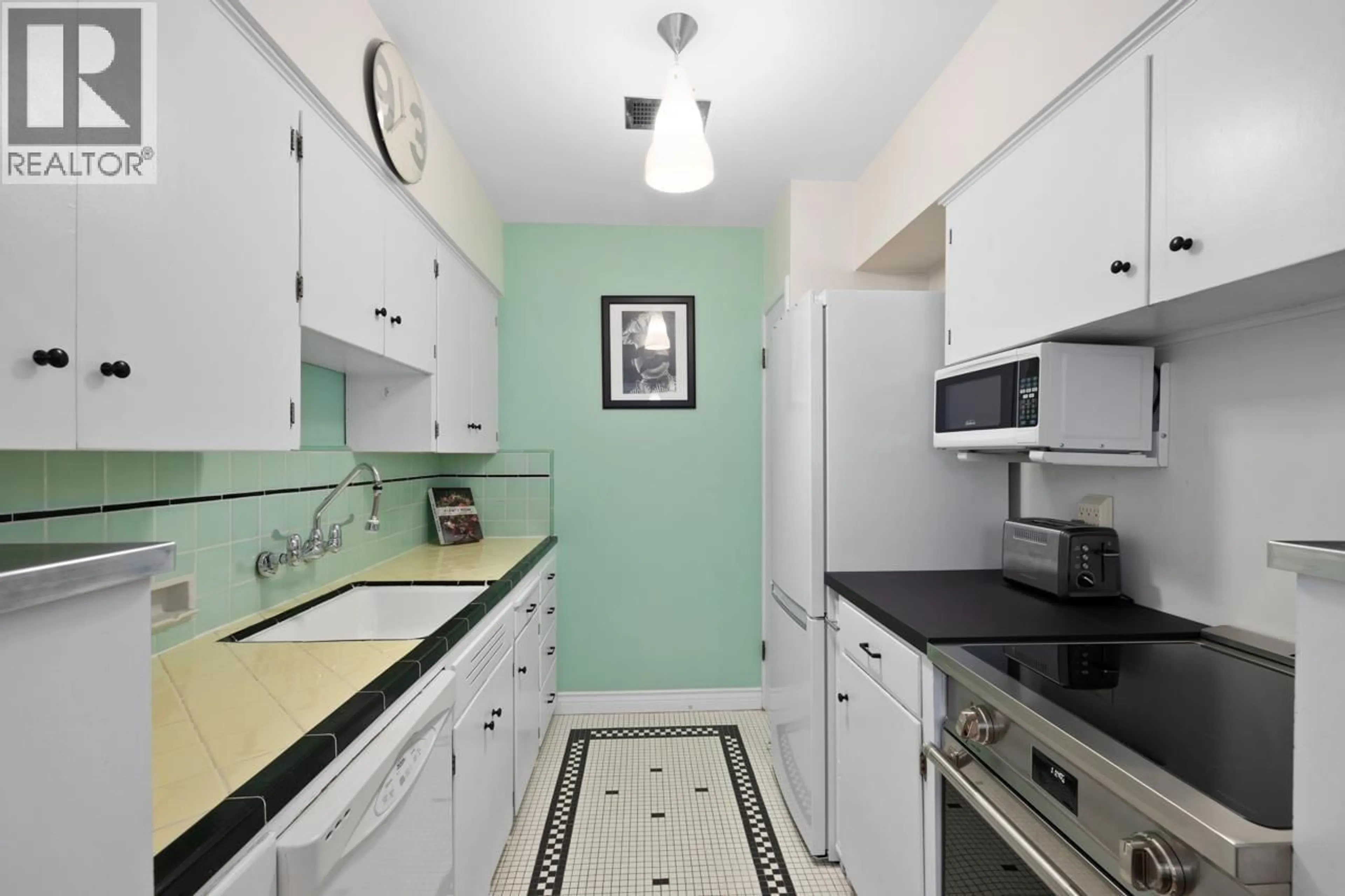 Standard kitchen, ceramic/tile floor for 204 - 1565 BURNABY STREET, Vancouver British Columbia V6G2P7