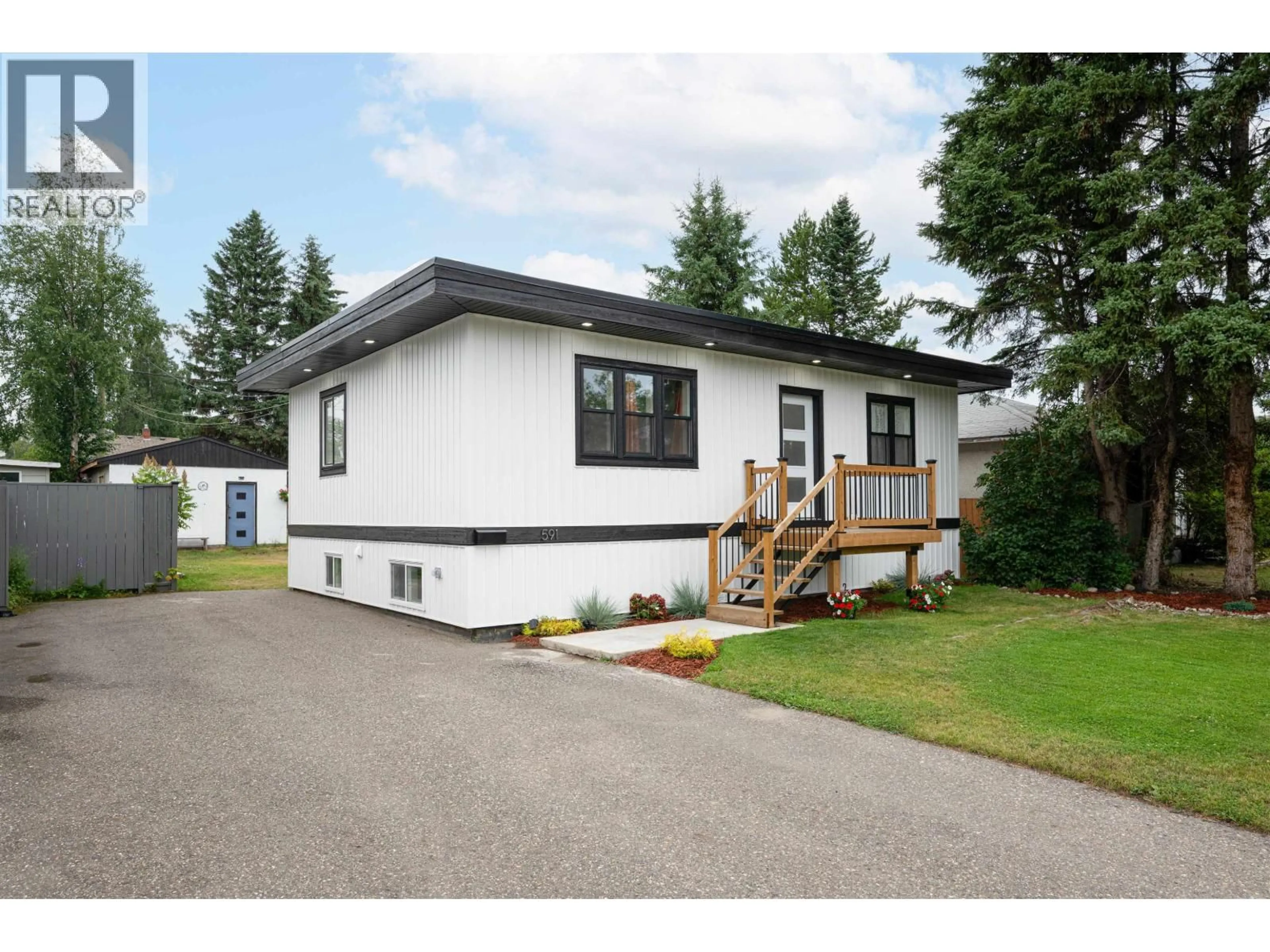 Home with vinyl exterior material, street for 591 DOUGLAS STREET, Prince George British Columbia V2M2M5