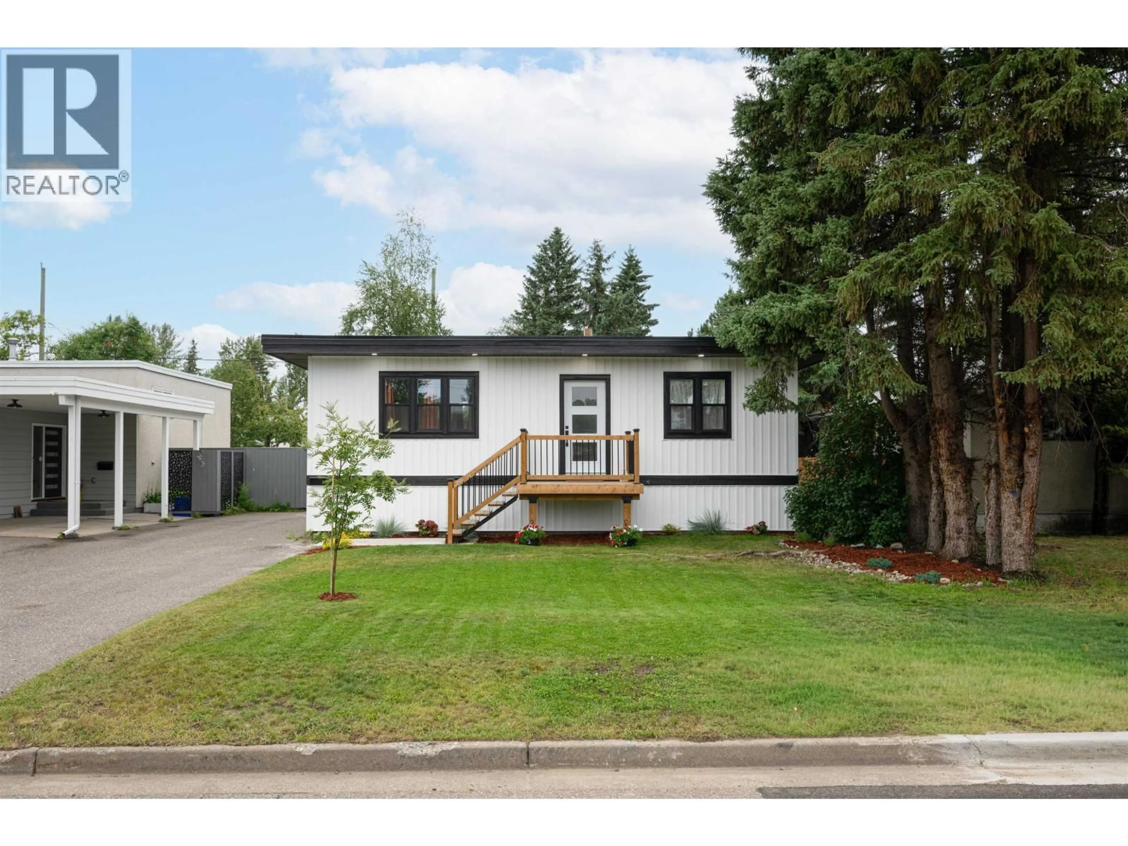 Home with vinyl exterior material, street for 591 DOUGLAS STREET, Prince George British Columbia V2M2M5