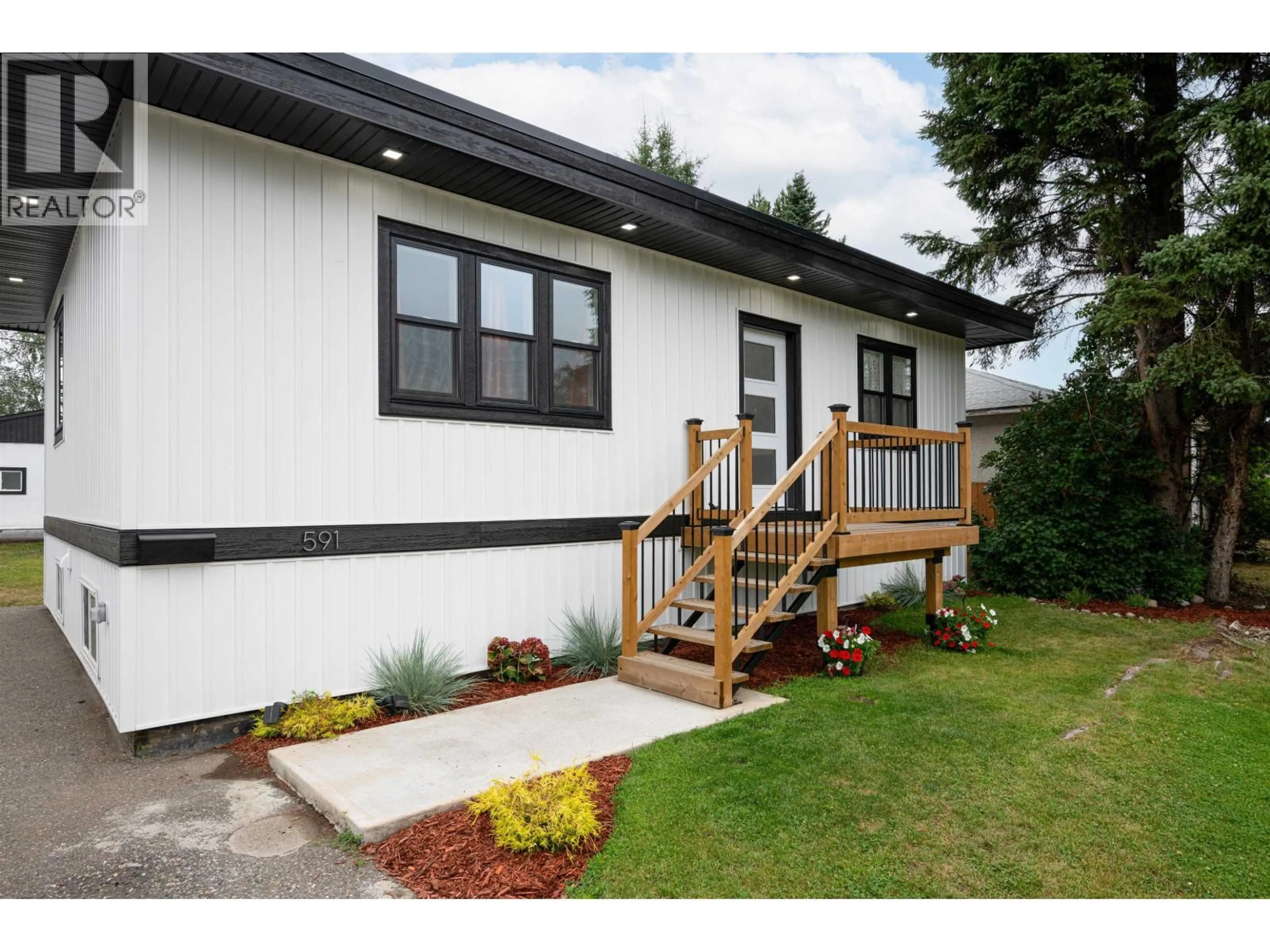 Home with vinyl exterior material, street for 591 DOUGLAS STREET, Prince George British Columbia V2M2M5
