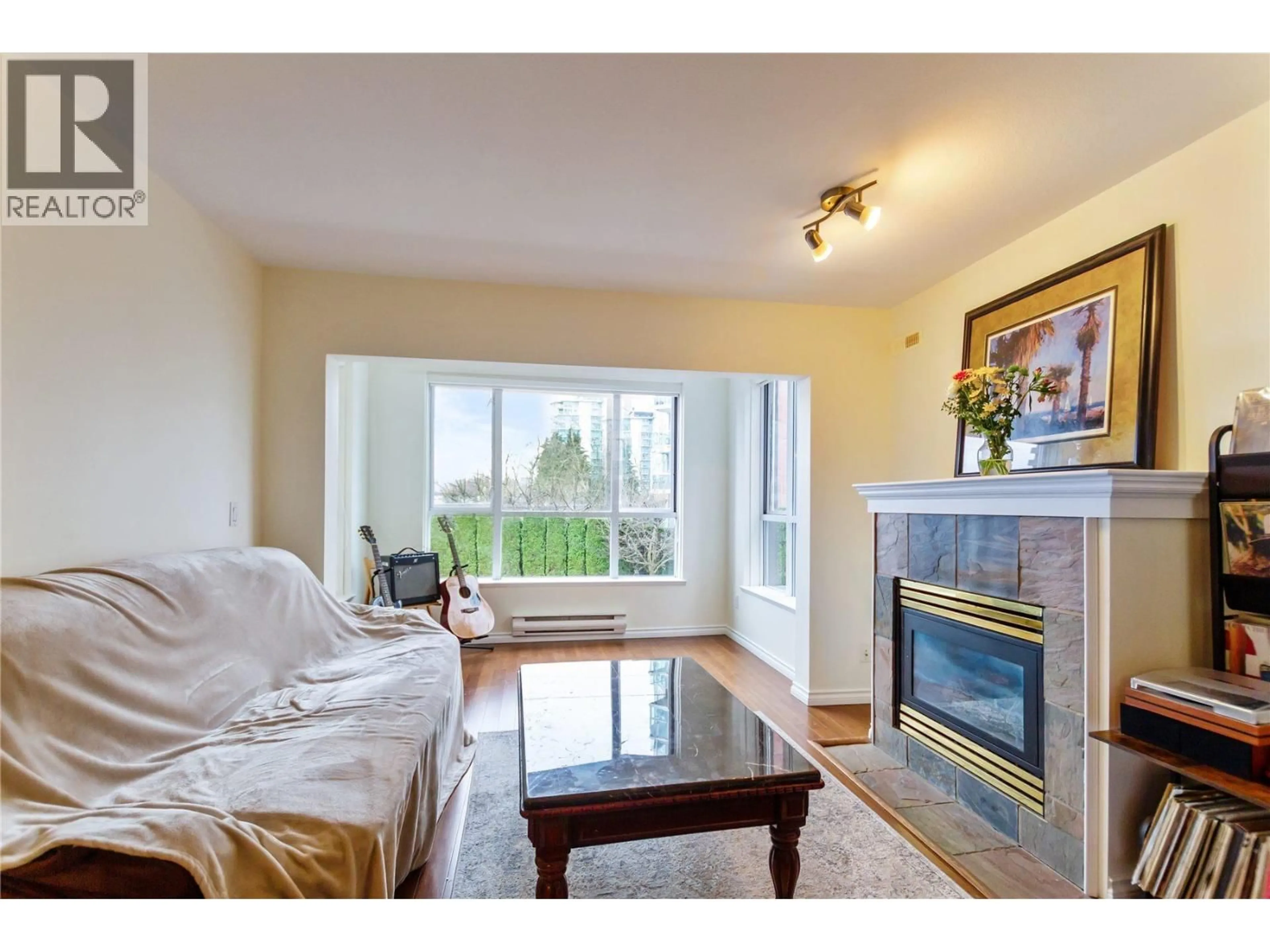 Living room with furniture, unknown for 204 - 155 3RD STREET, North Vancouver British Columbia V7L1E5