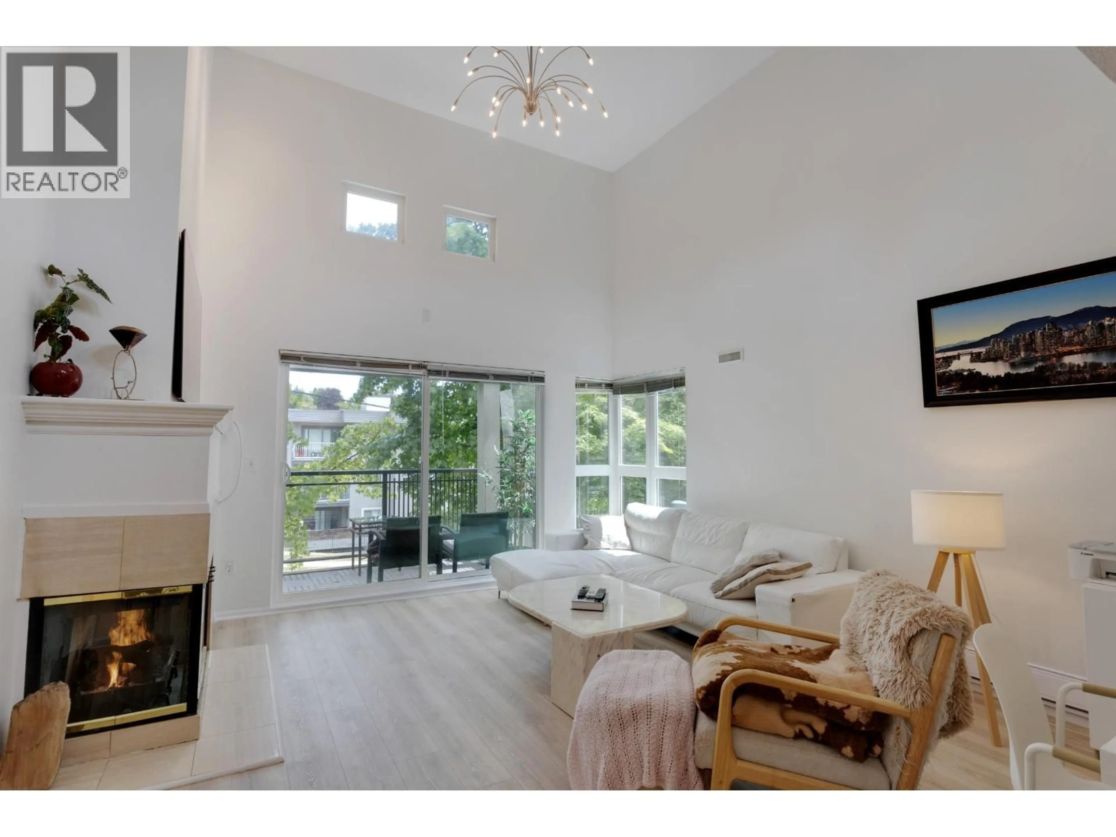Living room with furniture, unknown for 403 - 106 KINGS ROAD, North Vancouver British Columbia V7N2L8