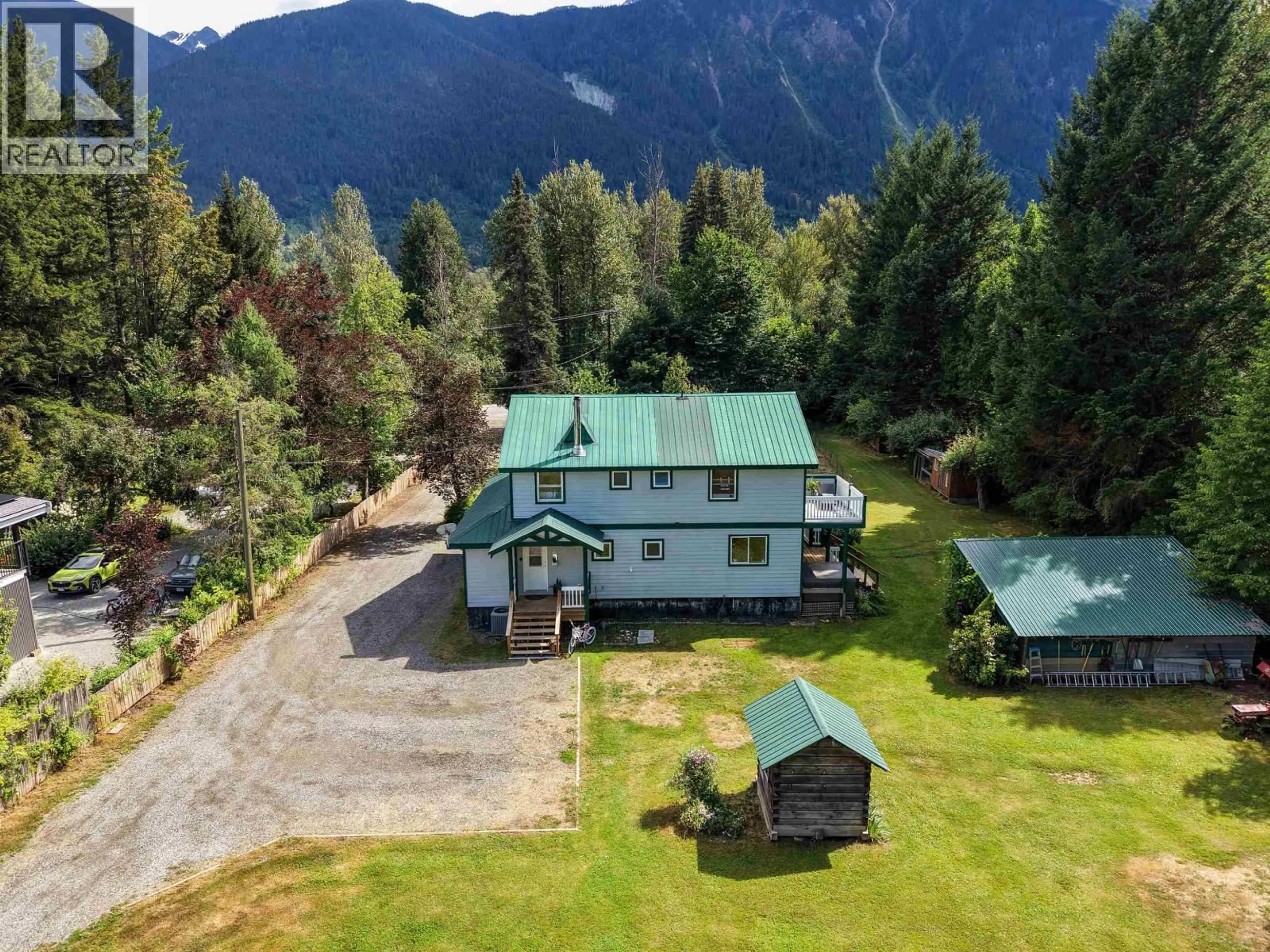 A pic from outside/outdoor area/front of a property/back of a property/a pic from drone, mountain view for 1985 HIGHWAY 99, Pemberton British Columbia V0N2K0
